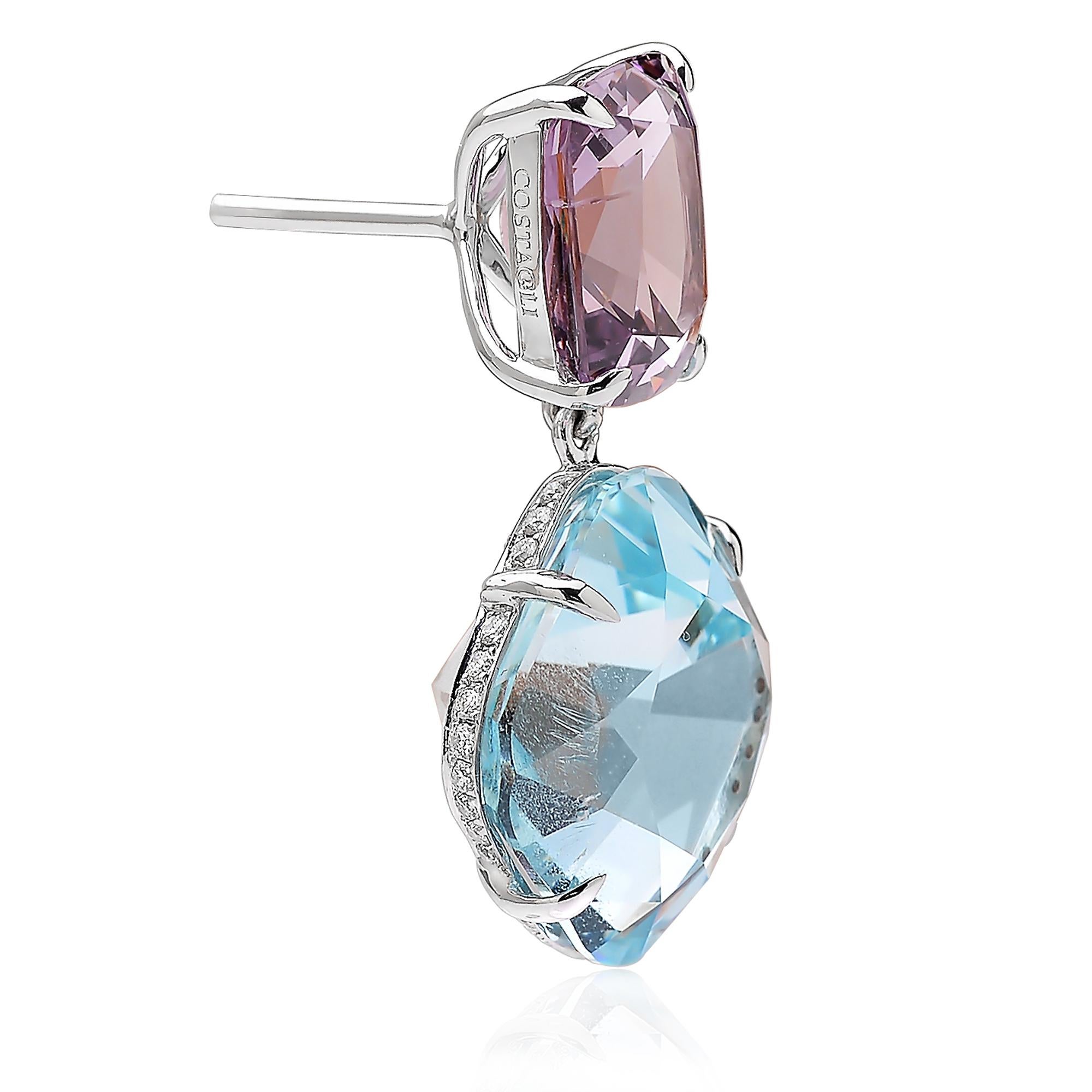 One of a kind aquamarine and spinel earrings set in 18 karat white gold with pave-set round, brilliant diamonds. 

Clean lines, great proportions and minimum weight were very carefully designed for the comfort of the wearer. 

Aquamarine: 13.03