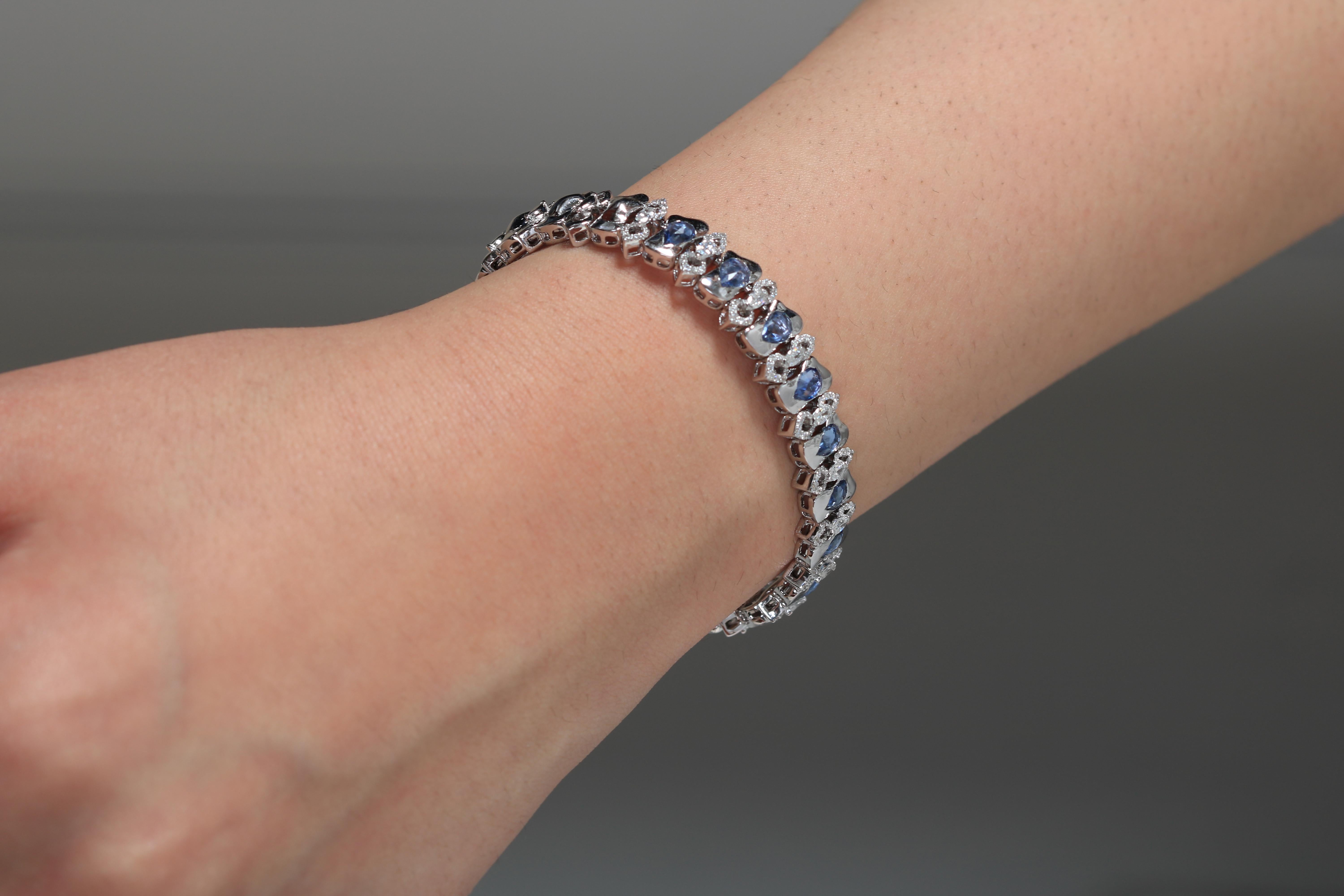 Artist 18 Karat White Gold Arabesque Bracelet with Blue Sapphires For Sale