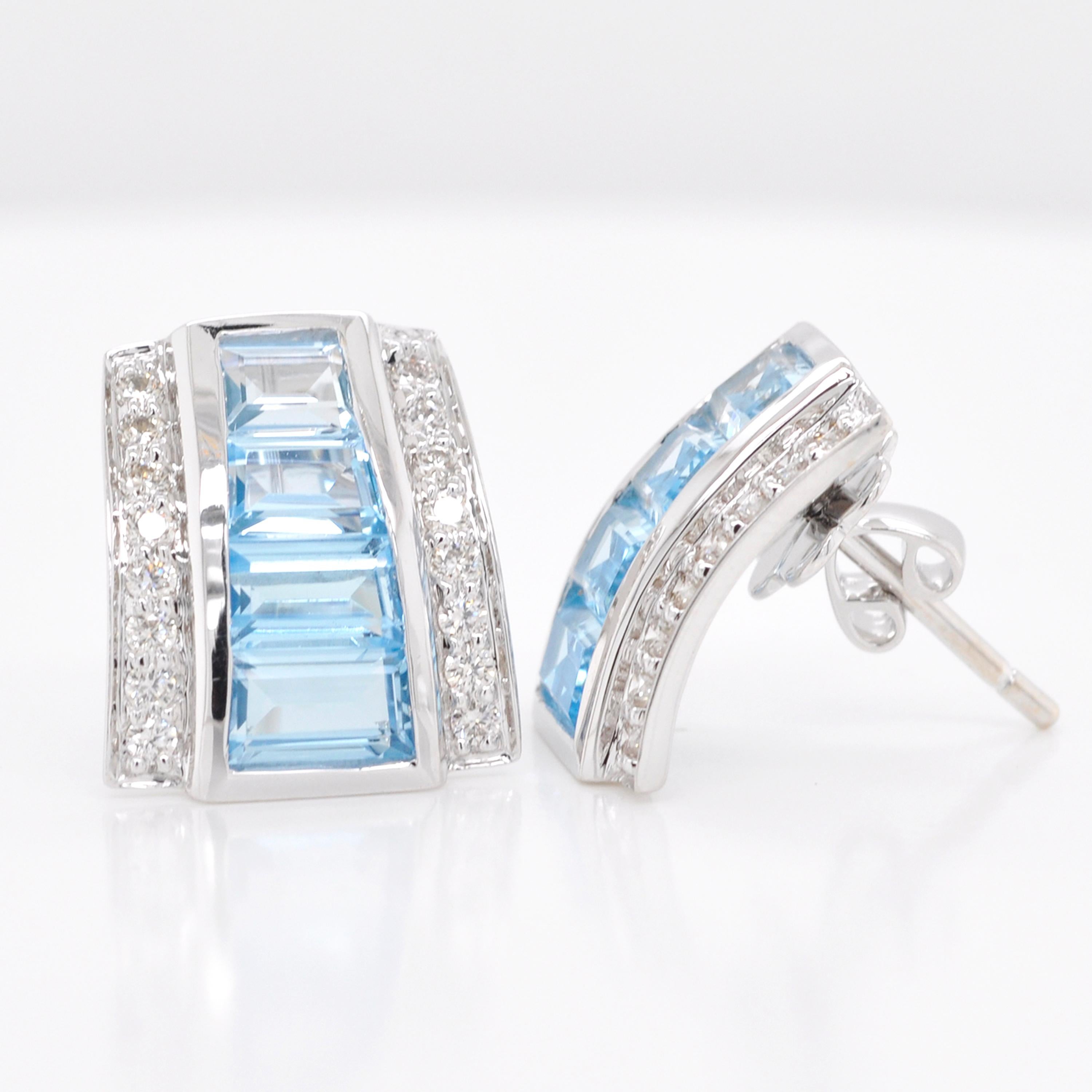 18 karat white gold art deco style blue topaz baguette diamond stud earrings

This incredible pastel hues of blue in blue topaz diamond stud earrings is mesmerizing. The impressive channel setting of the baguette cut gemstones is enclosed in a