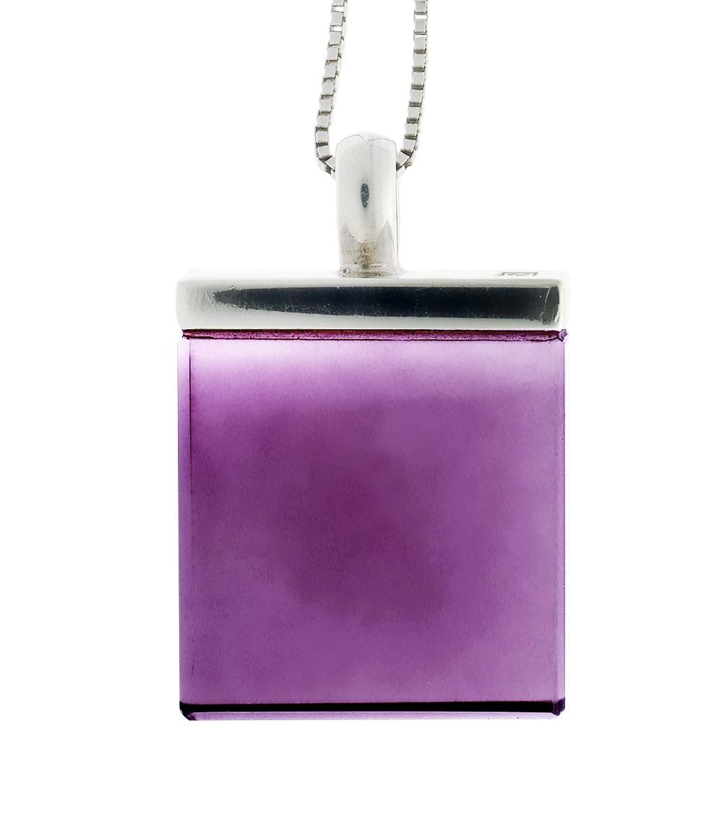This contemporary pendant necklace is a stunning piece of jewellery crafted in 18 karat white gold with a 15x15x8 mm natural amethyst. The gemstone was cut specially for the artist by the oldest company in Germany, which has been in the market since
