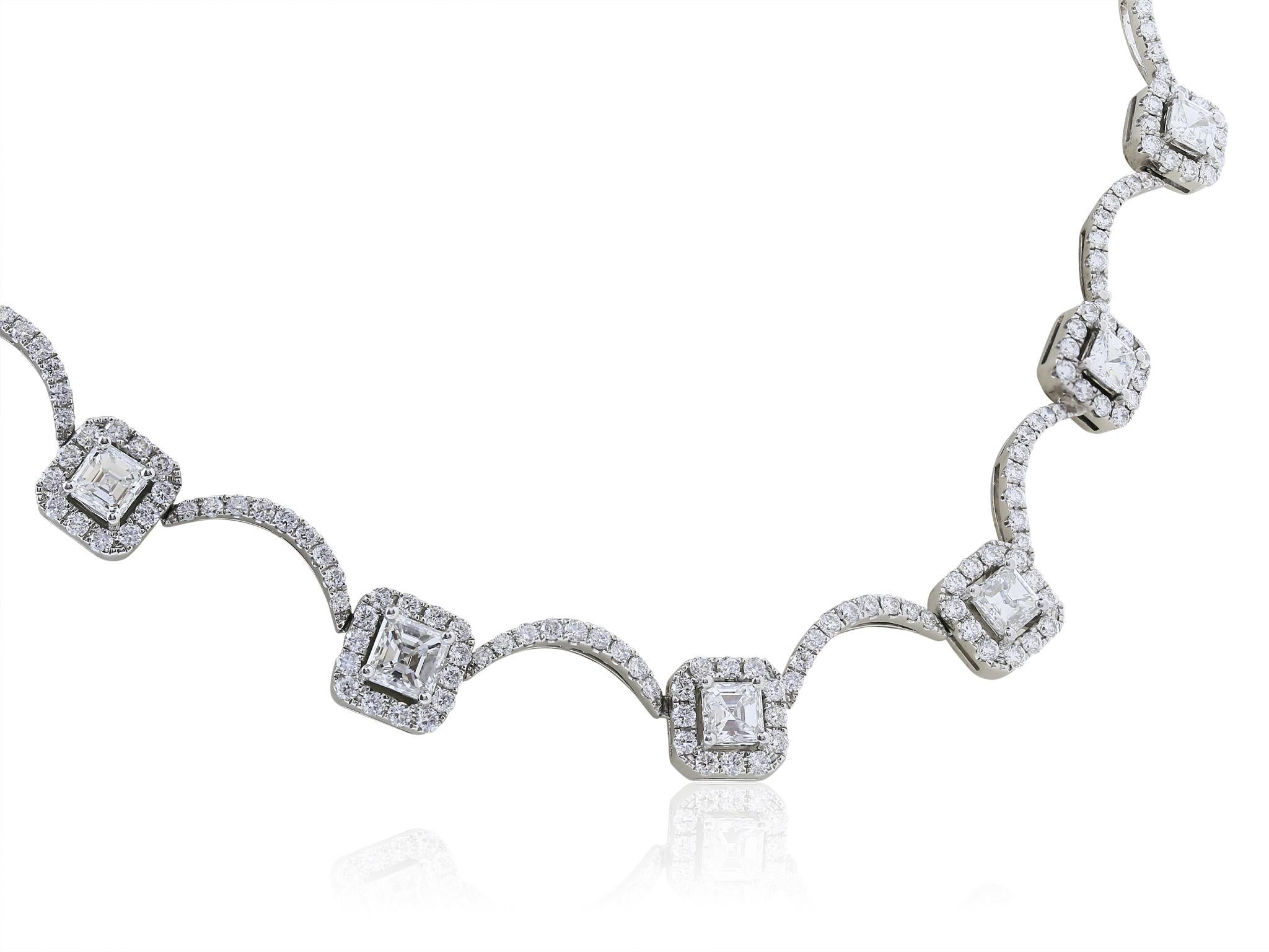 18 karat white gold diamond necklace featuring 20 Asscher cut diamonds with a total approximate weight of 5.94 carats, each diamond is framed with a halo of round brilliant cut diamonds, with a total weight of approximately 6.05 carats that follows