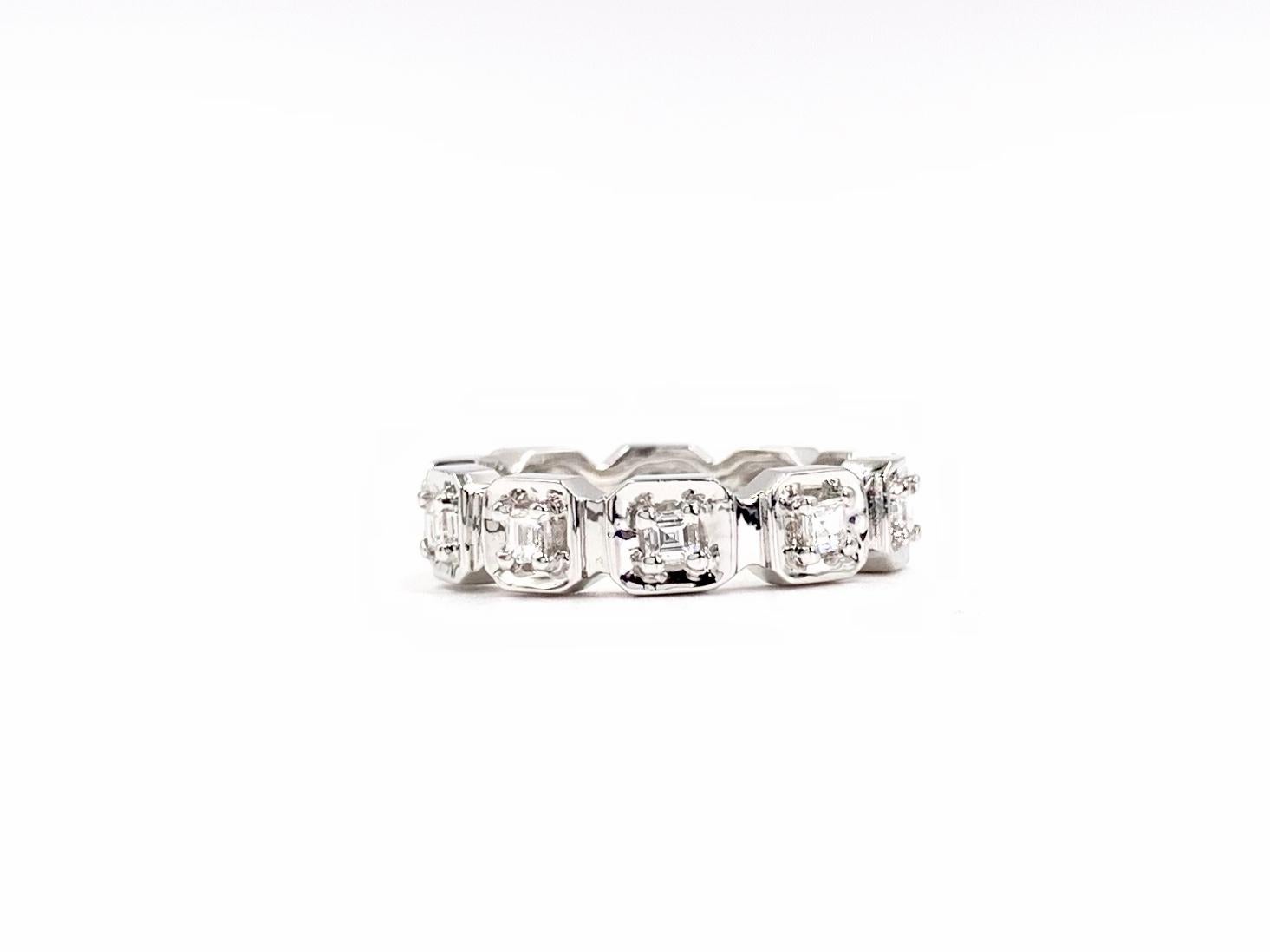 18 Karat polished white gold geometric diamond band featuring 10 petite asscher cut diamonds at .60 carats total weight, crafted by Martin Flyer. Diamond quality is approximately G color, VS2 clarity (near colorless, eye clean). At a 5mm width this