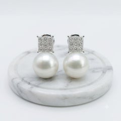 Boucles d'oreilles en or blanc 18 carats, avec perle australienne et diamant taille princesse, 2009