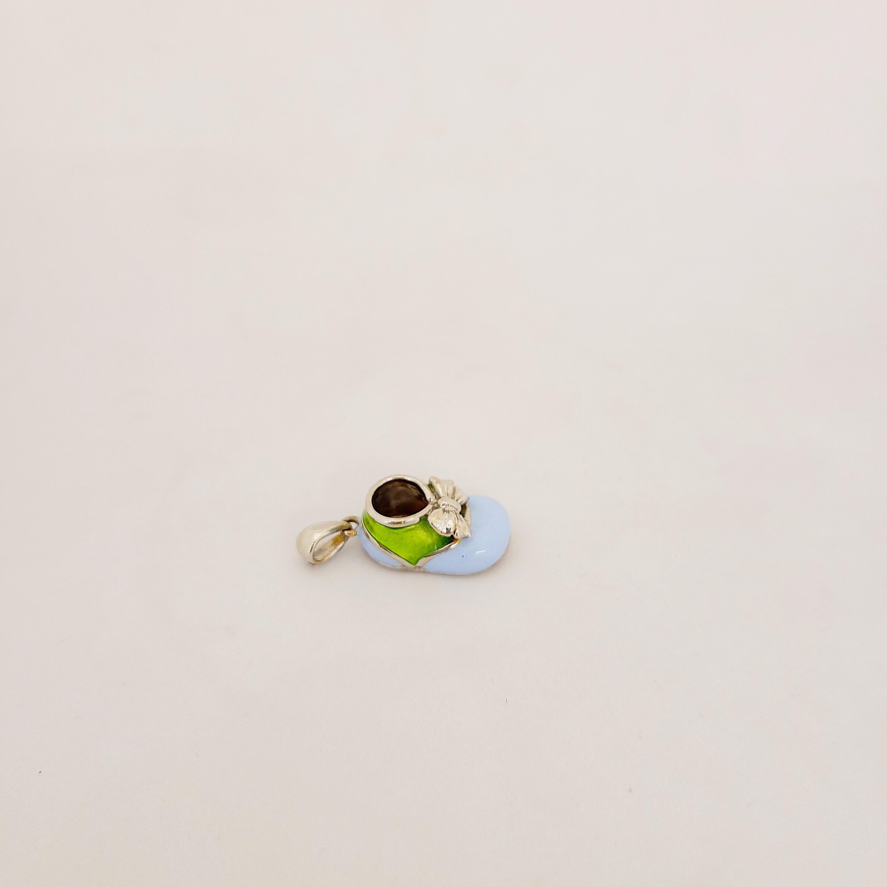 Modern 18 Karat White Gold Baby Shoe Charm with Light Blue and Green Enamel For Sale