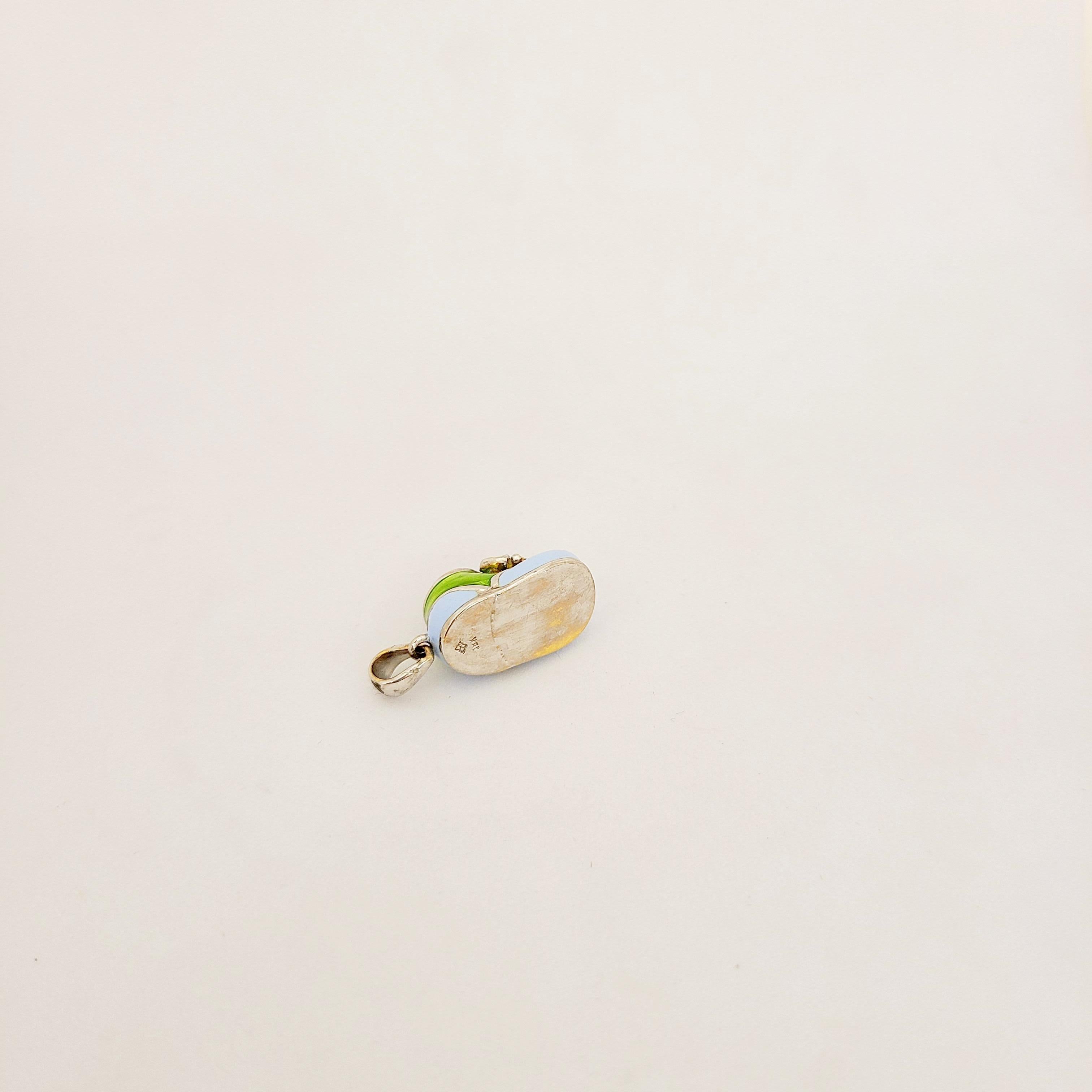 Women's or Men's 18 Karat White Gold Baby Shoe Charm with Light Blue and Green Enamel For Sale