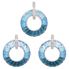 Boucles d'oreilles cercle en or blanc 18 carats avec topaze bleue taillée en baguette et diamant