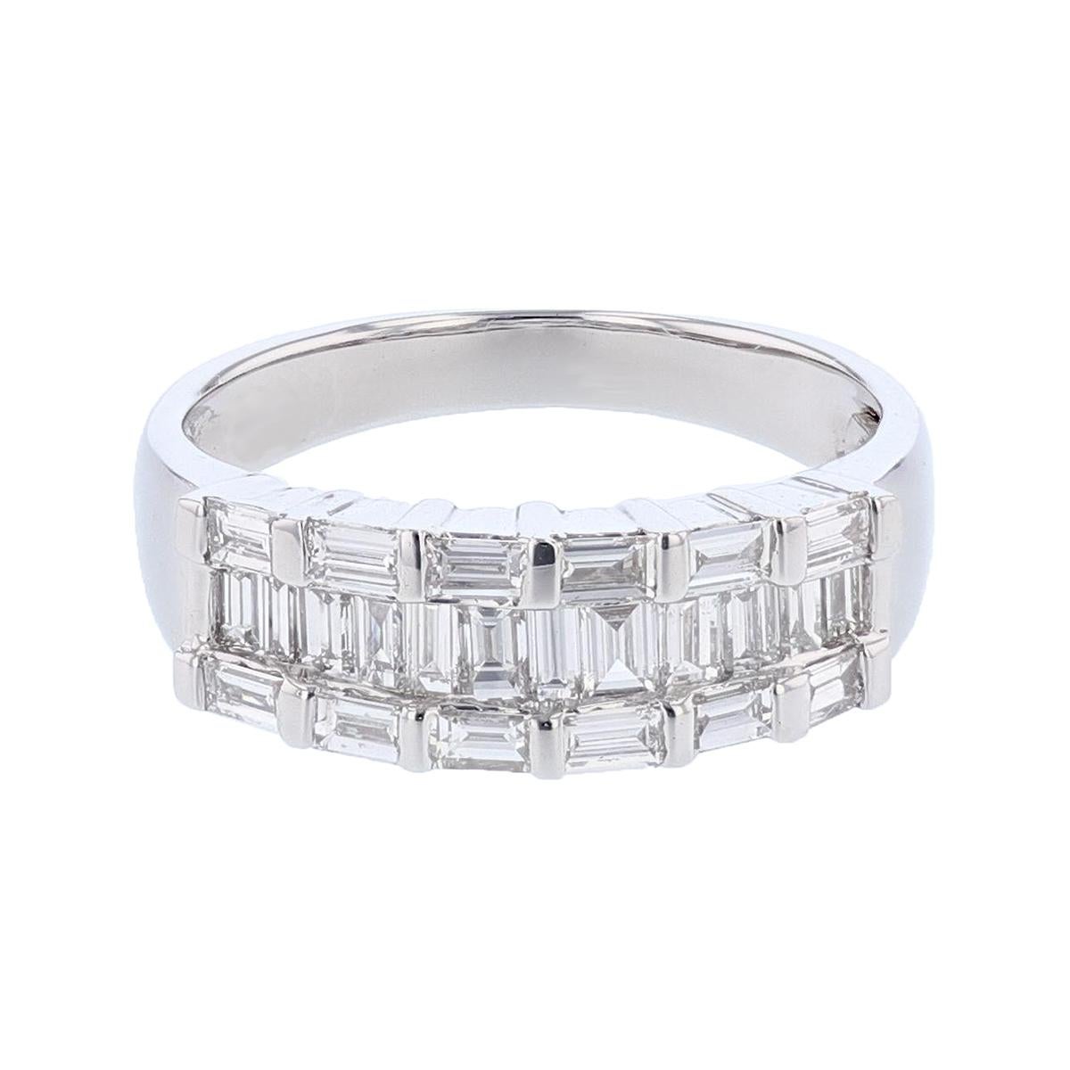 The ring is made in 18k white gold and features 24 baguette cut diamonds, channel set weighing 1.15cts with a color grade (H) and clarity grade (SI2). 