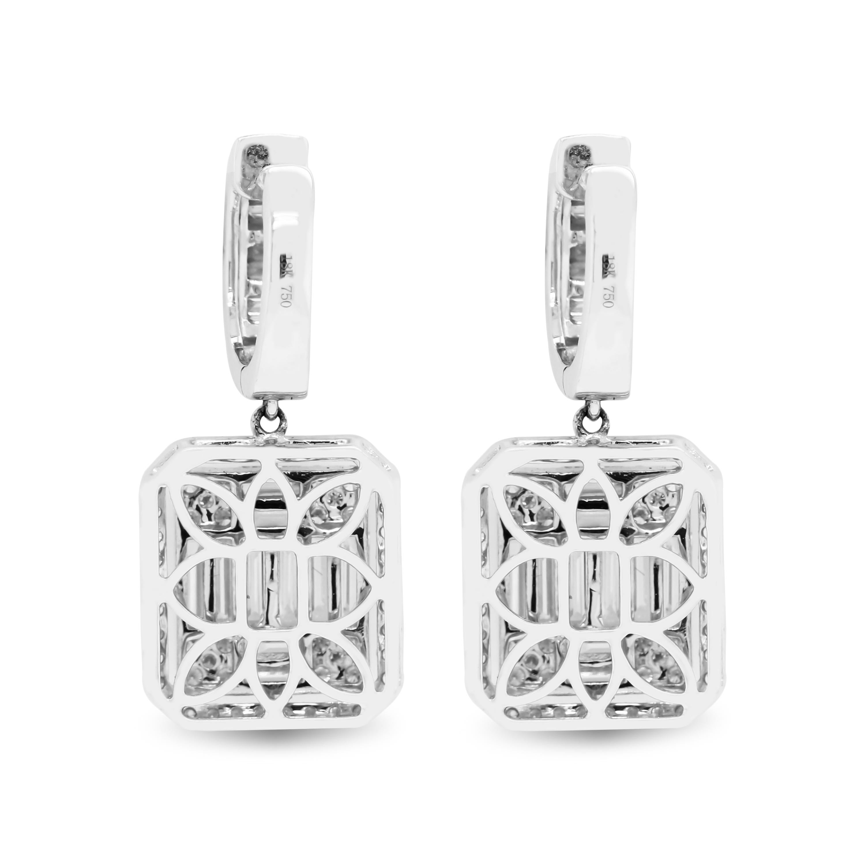 18K White Gold Baguette Round Cut Diamond Drop Dangle Earrings

These earrings are a part of our illusion collection which features baguette and round cut diamonds giving an illusion of one large stone on each earring.

3.55 carat G color, VS