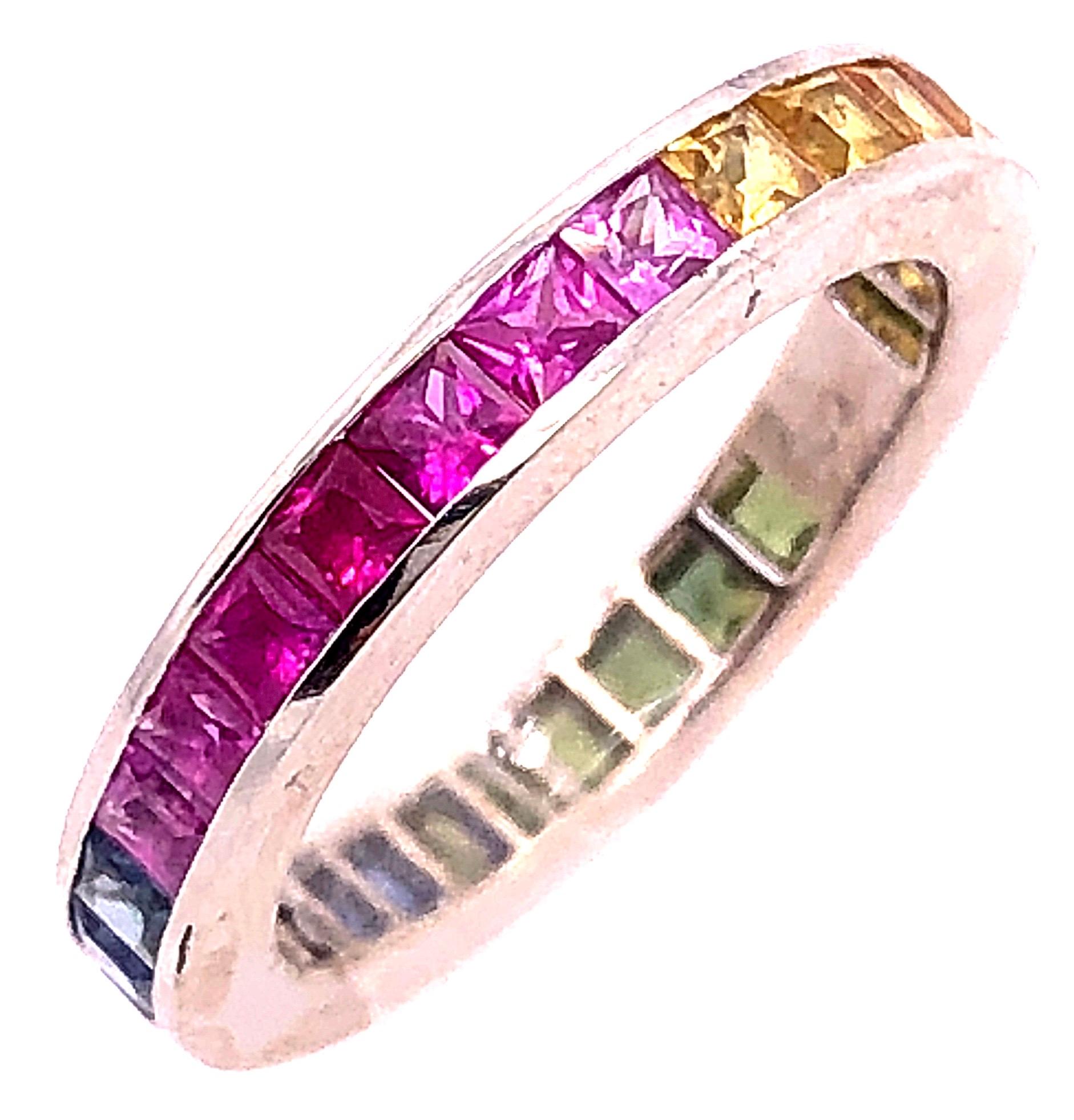 18 Karat White Gold Band / Ring with Multi Colored Semi Precious Stones
Size 5
3.23 grams total weight.