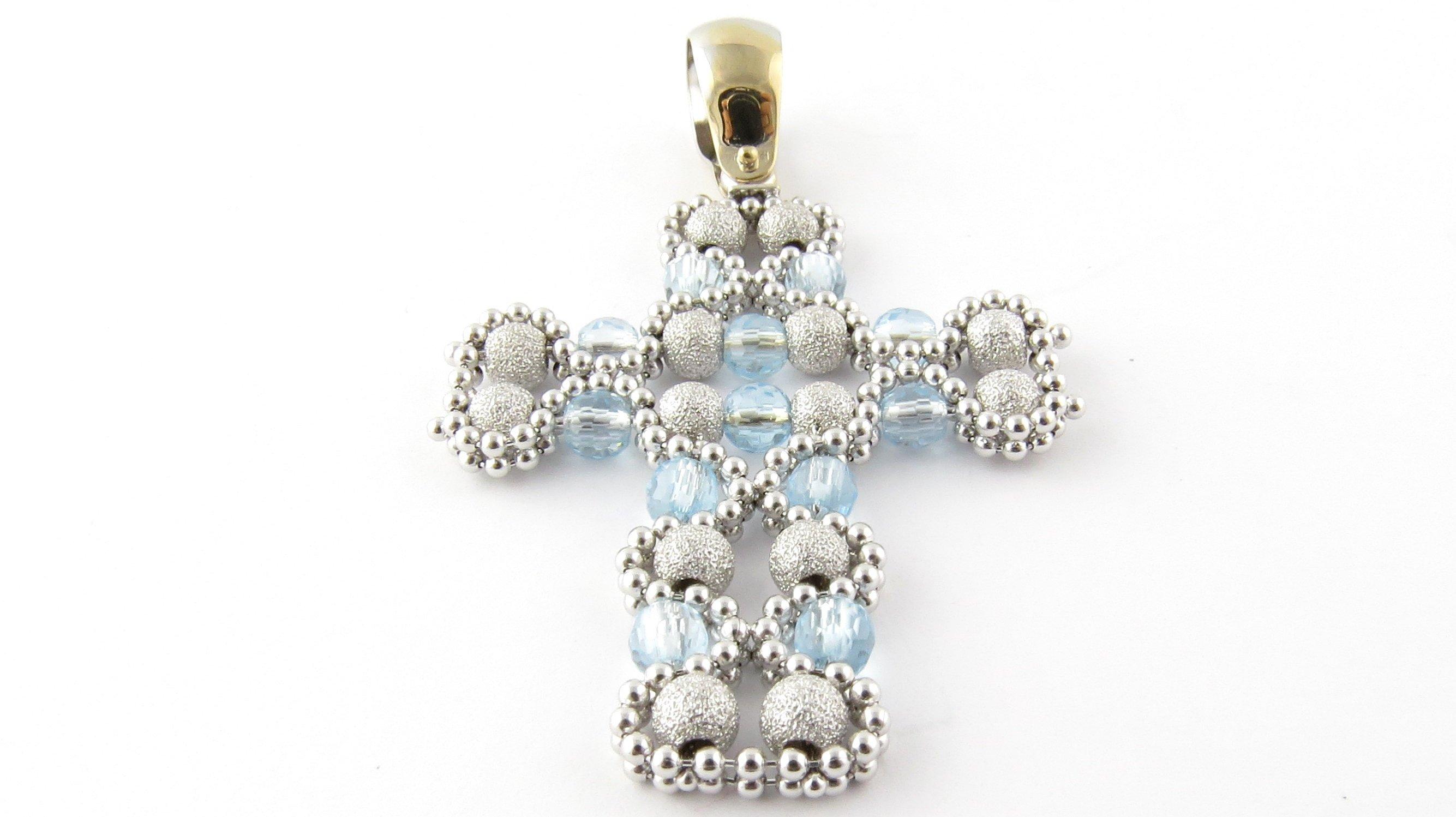 Vintage 18 Karat Yellow Gold Beaded Cross Pendant- 
This exquisite flexible articulated cross pendant features 14 sparkle finish white gold beads and 12 light blue beads surrounded by a beaded white gold frame. 
Size:    47 mm x  37 mm (actual