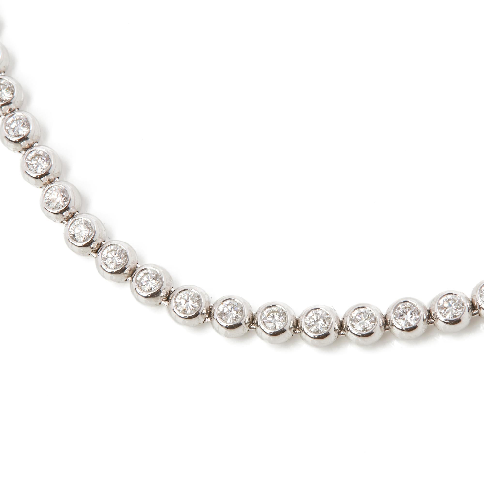 Code: COM2020
Description: 18k White Gold Beaded 4.50ct Diamond Necklace
Accompanied With: Presentation Box
Gender: Ladies
Necklace Length: 38cm
Necklace Width: 3mm
Clasp Type: Push Button
Condition: 9
Material: White Gold
Total Weight: 34.12g