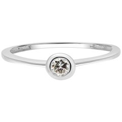 18 Karat White Gold Bezel Design Ring Set with a Brilliant Cut Diamond 18 Karat White Gold Bezel Design Ring Set with a Brilliant Cut Diamond