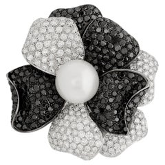 18 Karat White Gold Black and White Diamond and Pearl Flower Pin