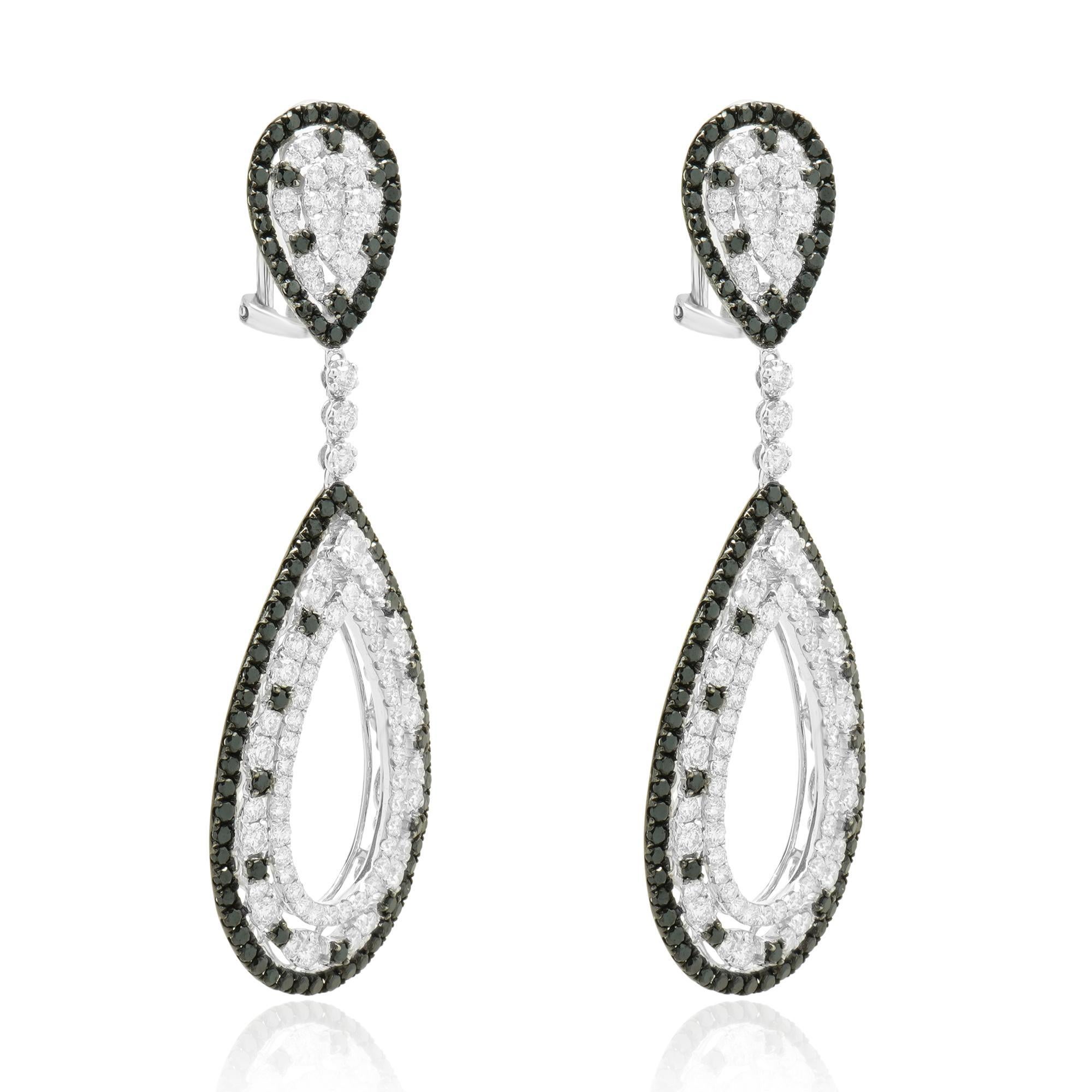 Material: 18K White Gold
Diamonds: round brilliant cut = 7.31cttw
Color: G / BLK
Clarity: SI1-2
Dimensions: earrings measure approximately 2.5-inches long
Fastenings: omega backs
Weight: 18.45 grams