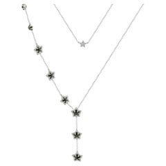 18 Karat White Gold Black and White Diamond Star Drop Necklace