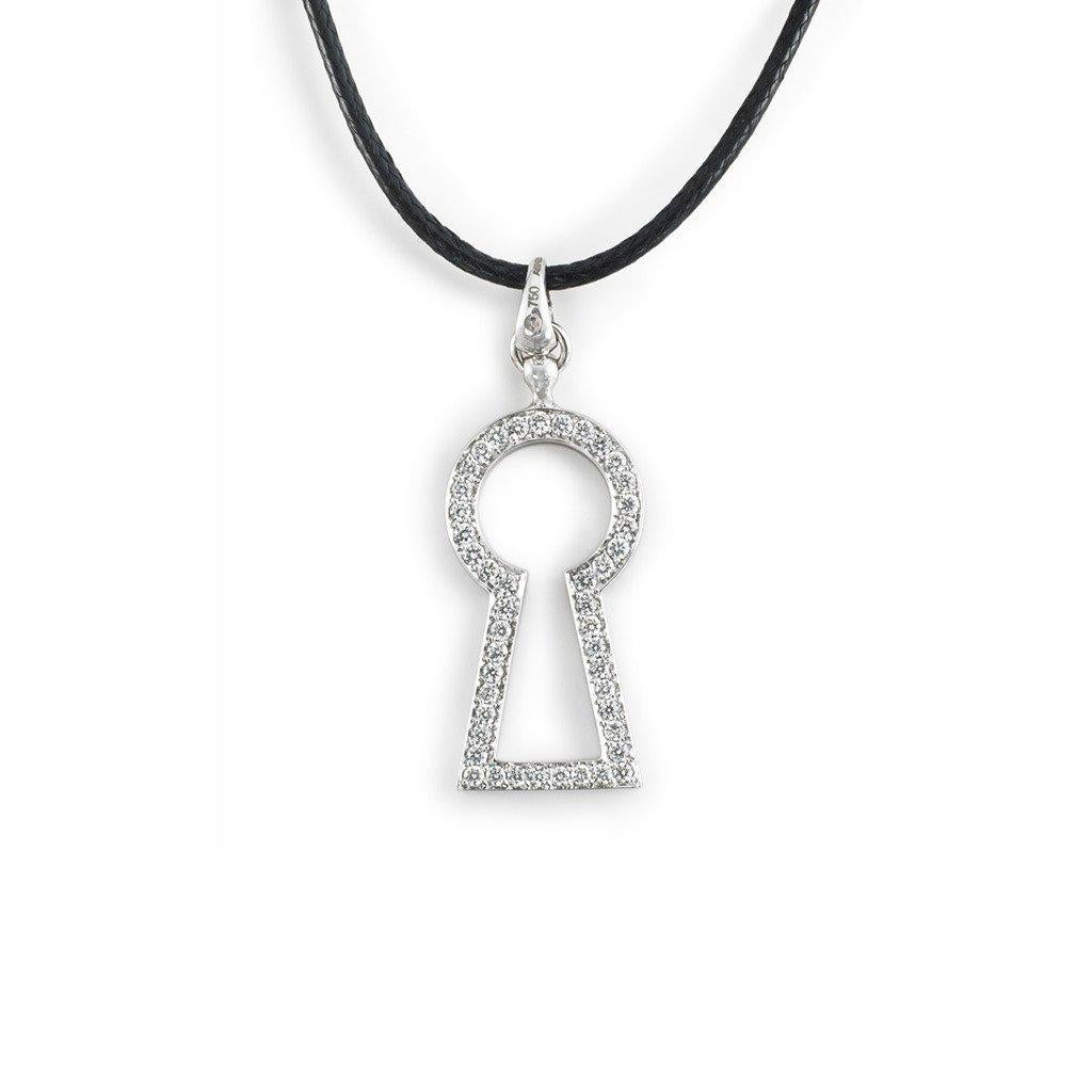 This LOVE Lock Pendant with black diamonds is handcrafted in white gold, sterling silver, rhodium on a cotton cord.

Stones: Black (F-G/VVS) diamonds: 0,26ct.
Material: White Gold 18k, Sterling Silver 925, Black Rhodium

The Pendant is available