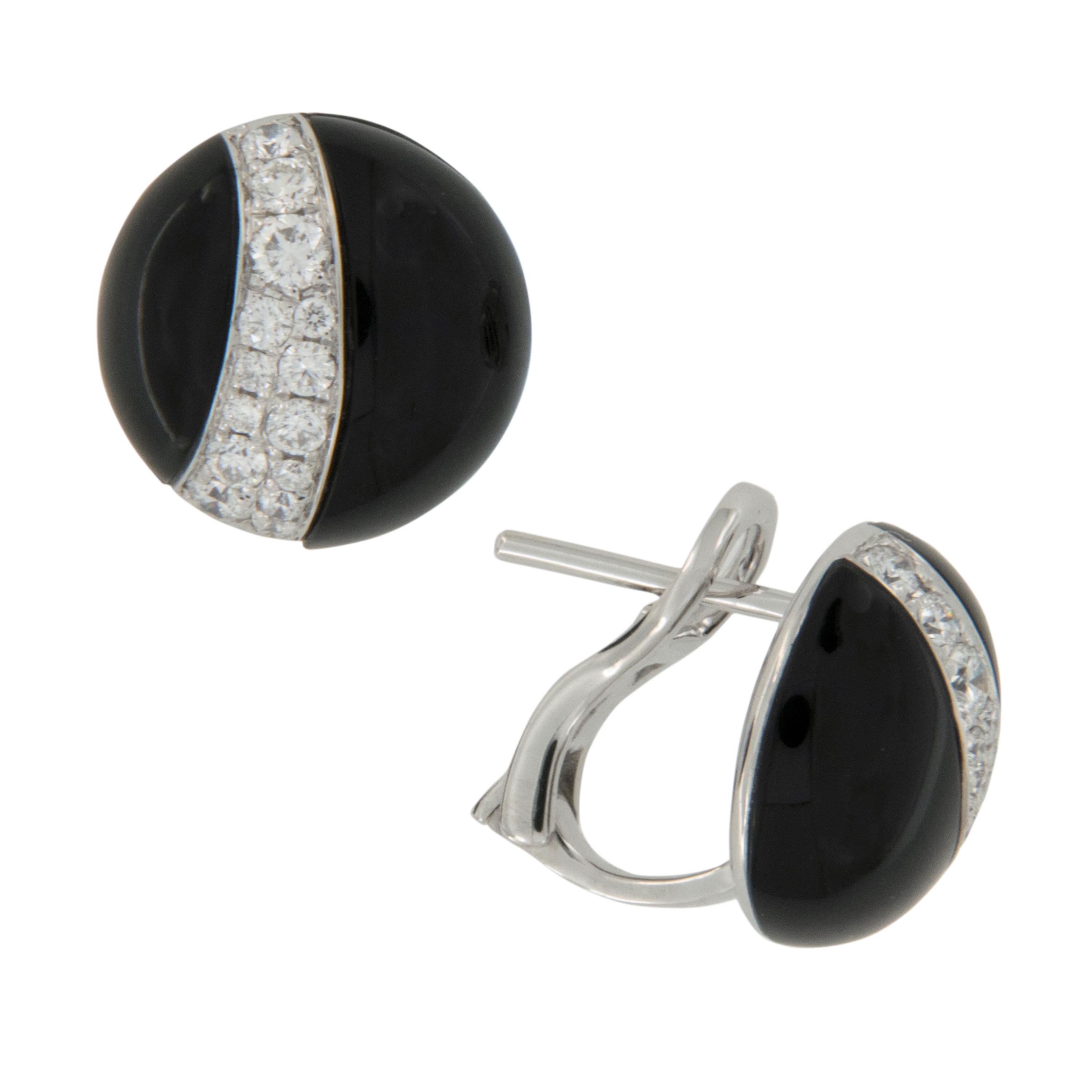 Classic is the perfect description for these earrings! 18 karat white gold round black onyx with curved pave' diamonds = 0.55 Cttw in the timeless button style. Posts with omega clip backs for security of wear. Complimentary signature wrapping &