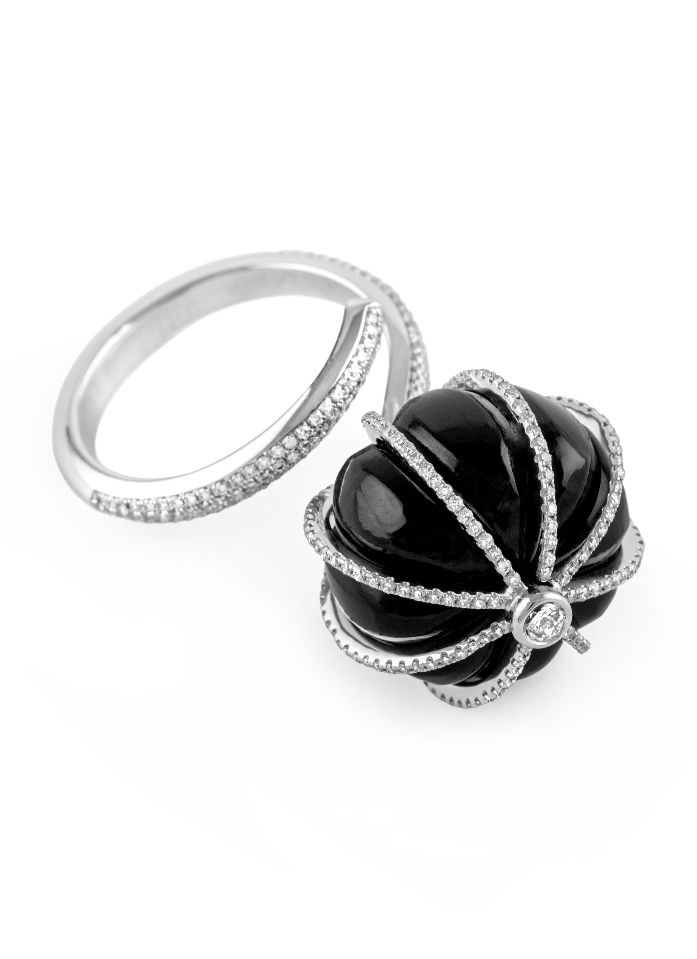 Atelo’s Boule Collection combines voluminous shapes with vivid colours, resulting in bold yet charming

Black onyx is finely wrapped with brilliant-cut diamonds in this cocktail ring in 18 karat white gold.

A truly distinct design and exquisite