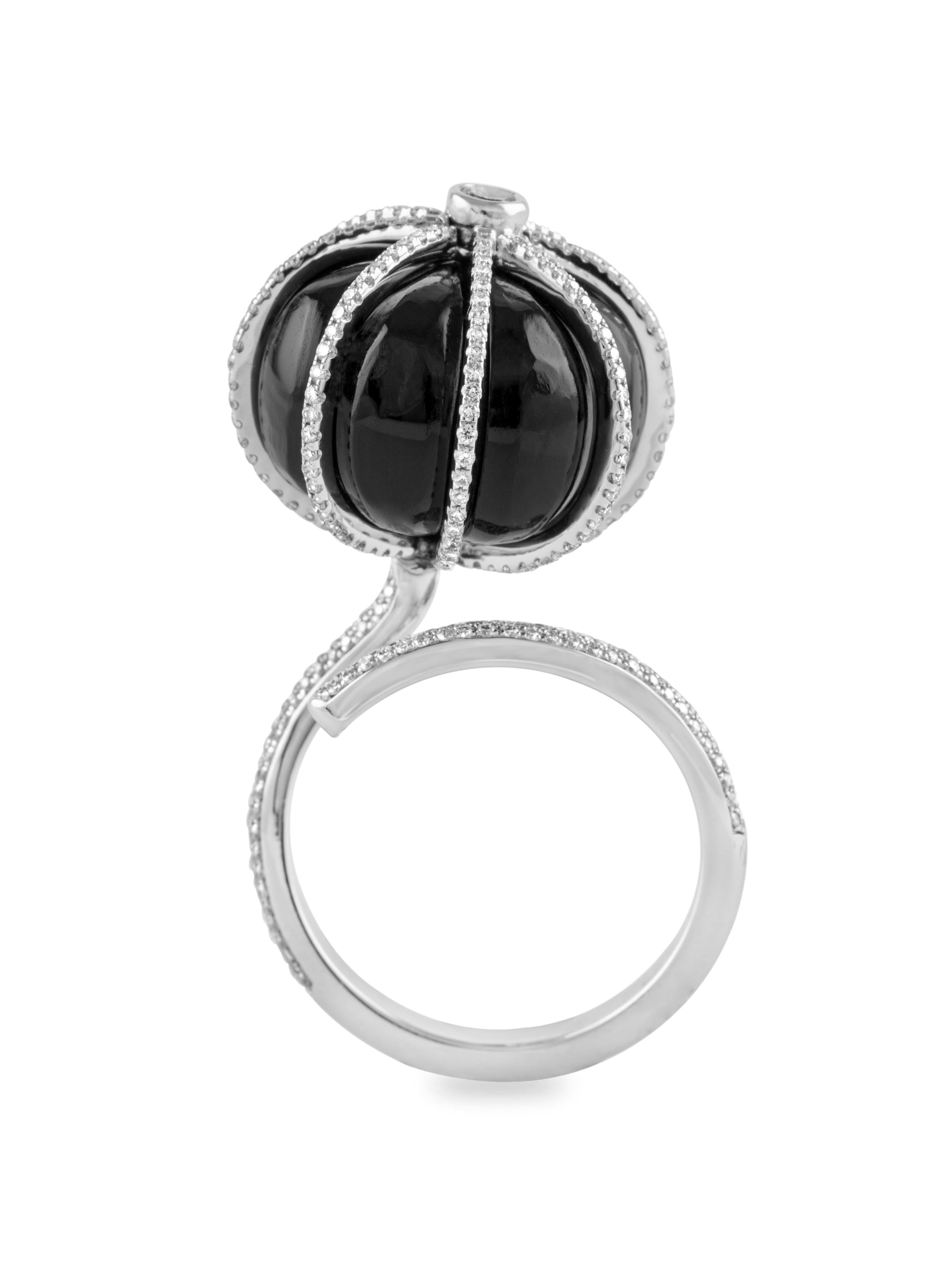 Contemporary 18 Karat White Gold Black Onyx and Diamond Cocktail Ring For Sale