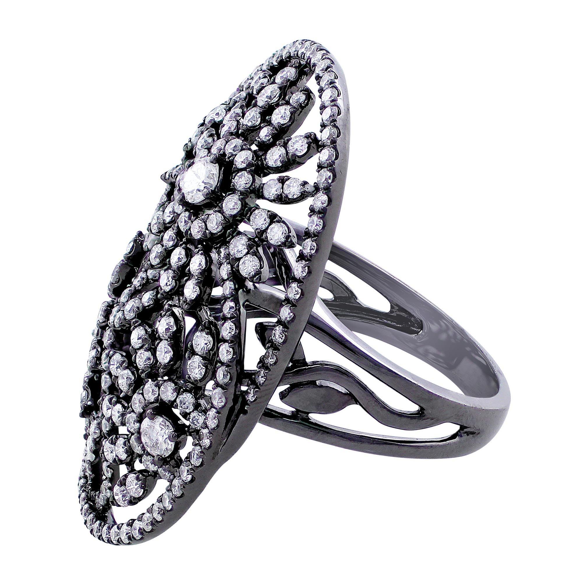 Black Rhodium Floral Scroll Ring. A delicate 18k white gold and black rhodium oval ring in a floral scroll design set with pave diamonds weighing 1.98 carats total weight. The floral scroll design extends down the ring shank.

Size 6.75