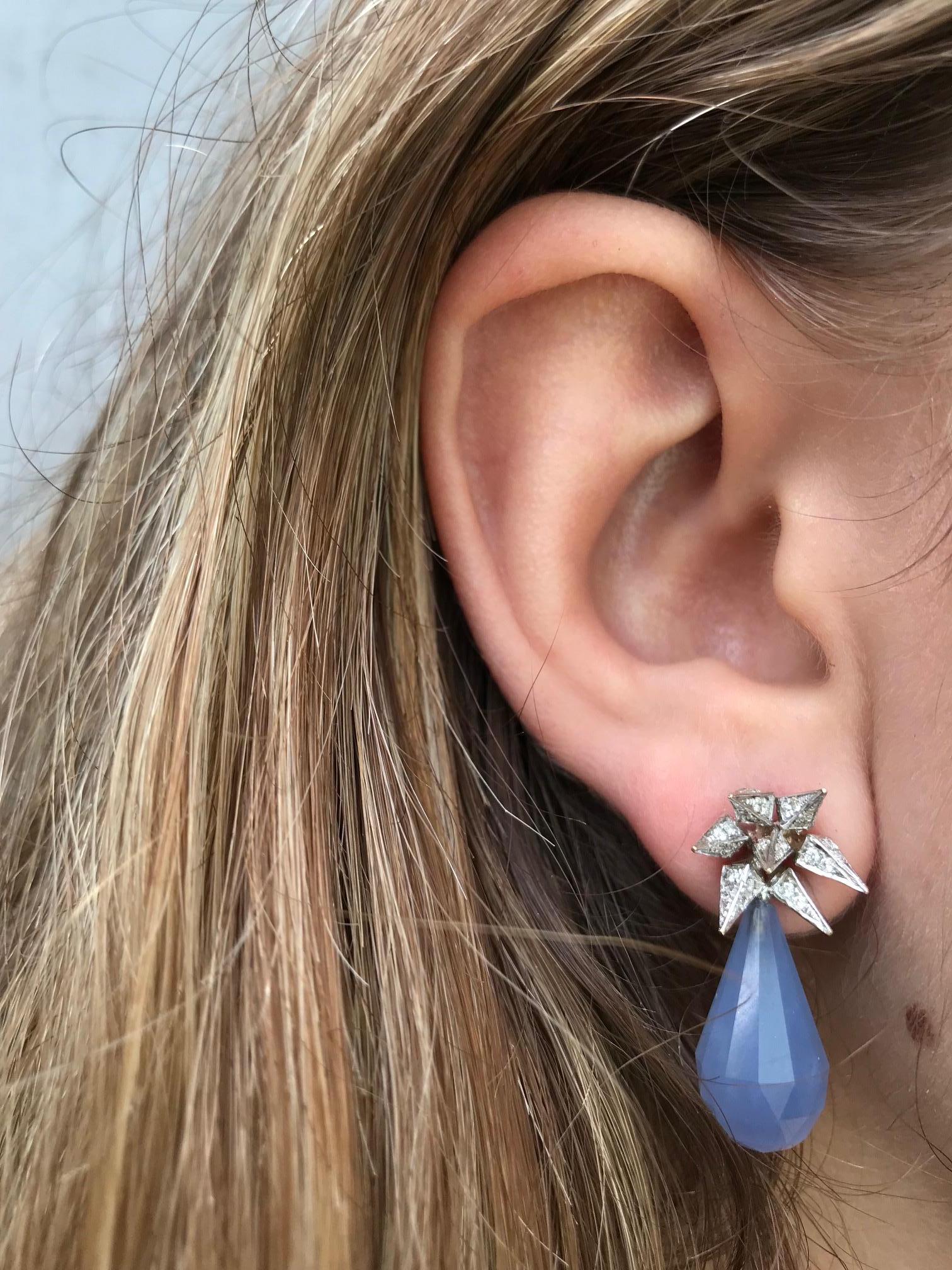 Blue Chalcedony Diamond Hedgehog Spike Earrings feature two white diamond pave spike hedgehog studs with faceted pear shaped blue chalcedony drops
Includes 18k White Gold push closure earring backings 
18k White Gold, White Diamonds, Blue Chalcedony