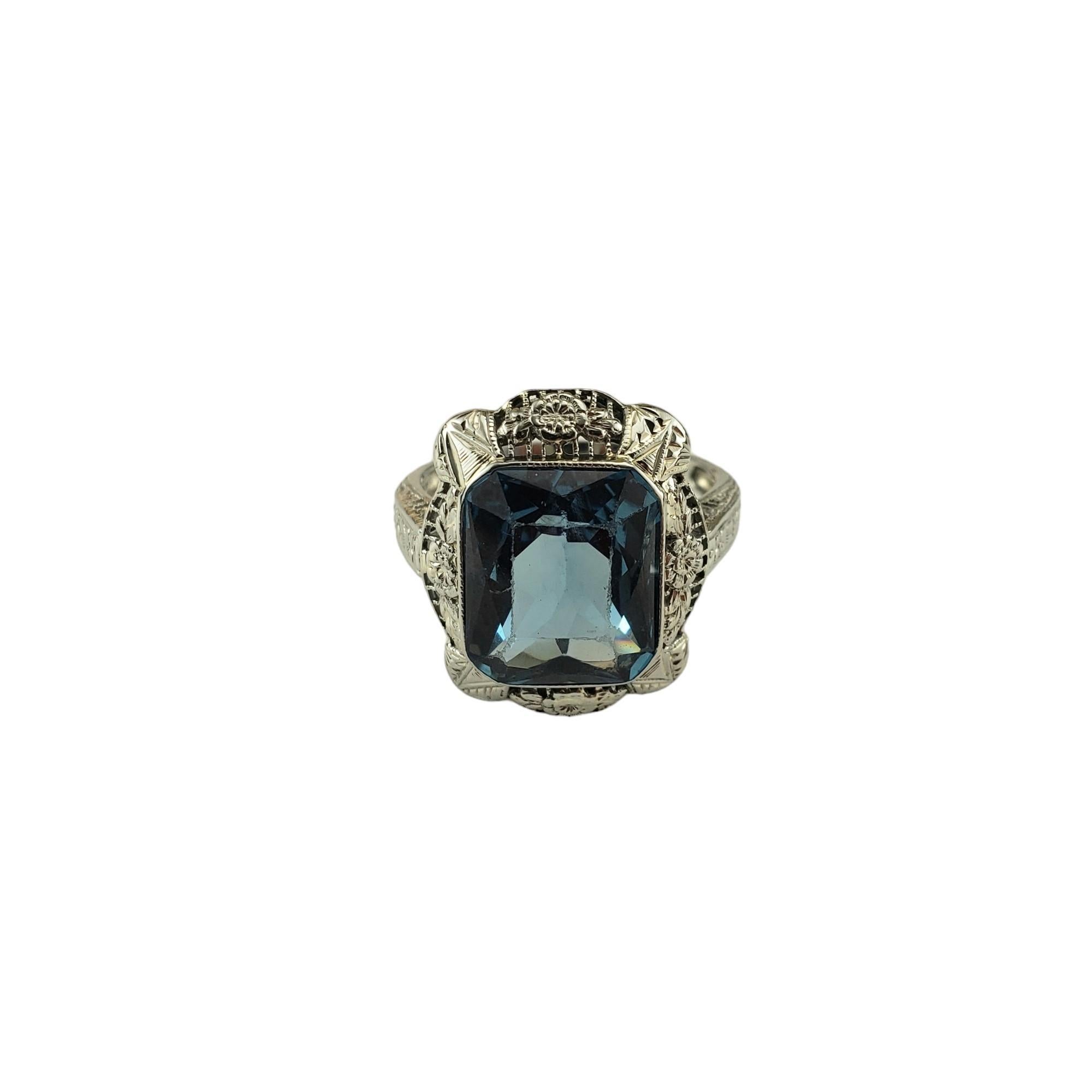 18K White Gold Blue Glass Ring Size 6.25

This lovely ring features one rectangular blue glass stone* (12.5 mm x 10.5 mm) set in beautifully detailed 18K white gold.  

Width: 18.5 mm.  Shank: 2 mm.

*Stone has superficial scratches not visible to