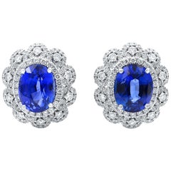 18 Karat White Gold Blue Oval Sapphire and Diamond Huggie Earrings
