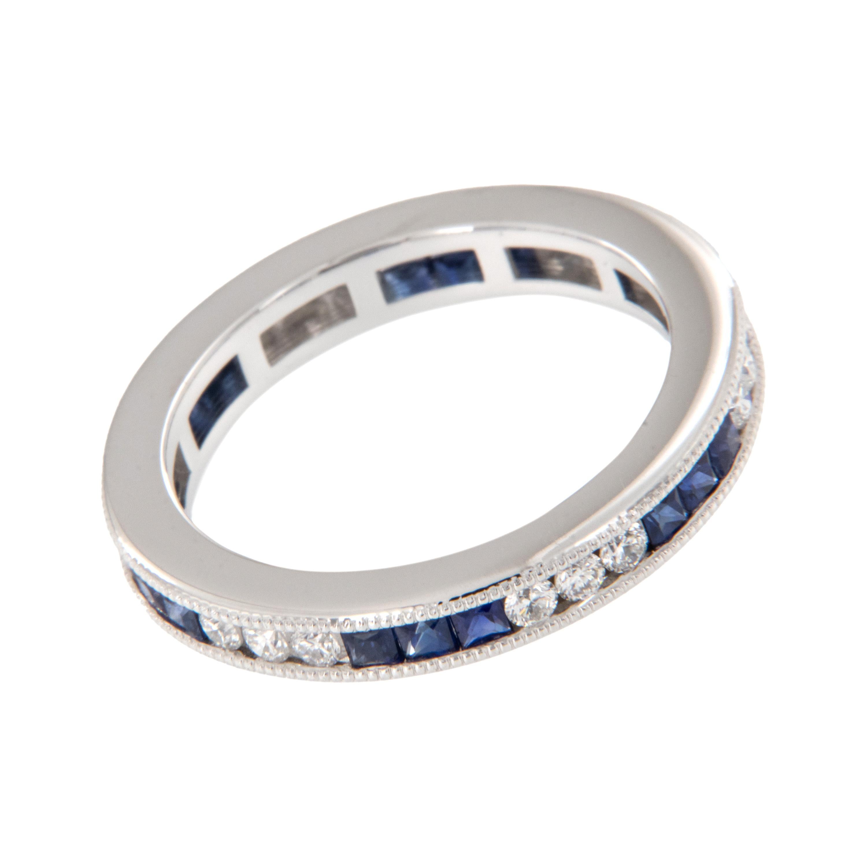 Brand new and made for CAMPANELLI & PEAR this Art Deco inspired band boasts 0.74 Cttw square step cut lively blue sapphires and 0.40 Cttw round brilliant fine diamonds channel set in alternating sections of three for a truly unique look. The clean