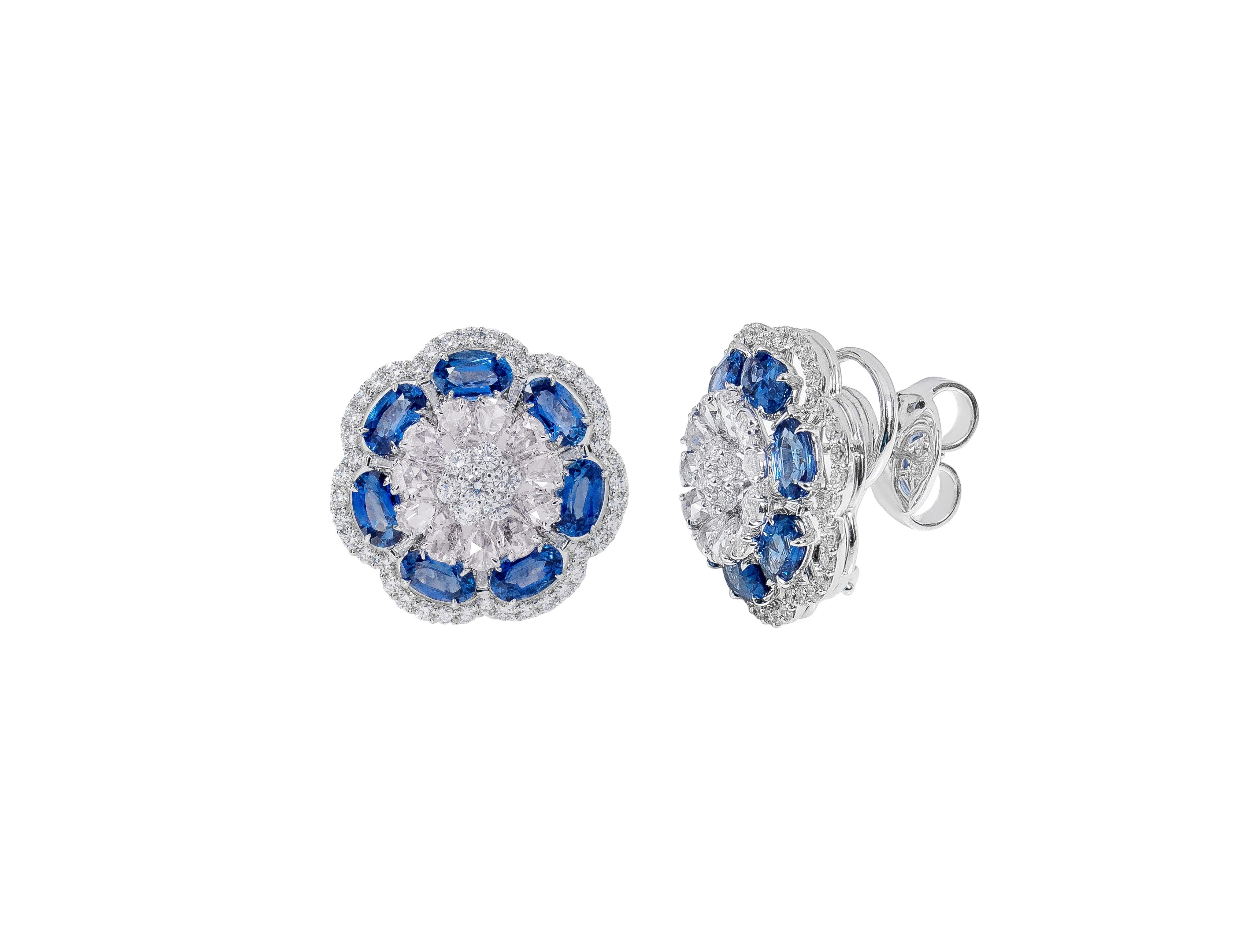 18 Karat White Gold Blue Sapphire and Diamond Contemporary Cluster Stud Earring

These convoluted cornflower blue sapphire ovals with the mix shape and cut of diamonds all layered together extraordinarily define the earring stud. The first layer is