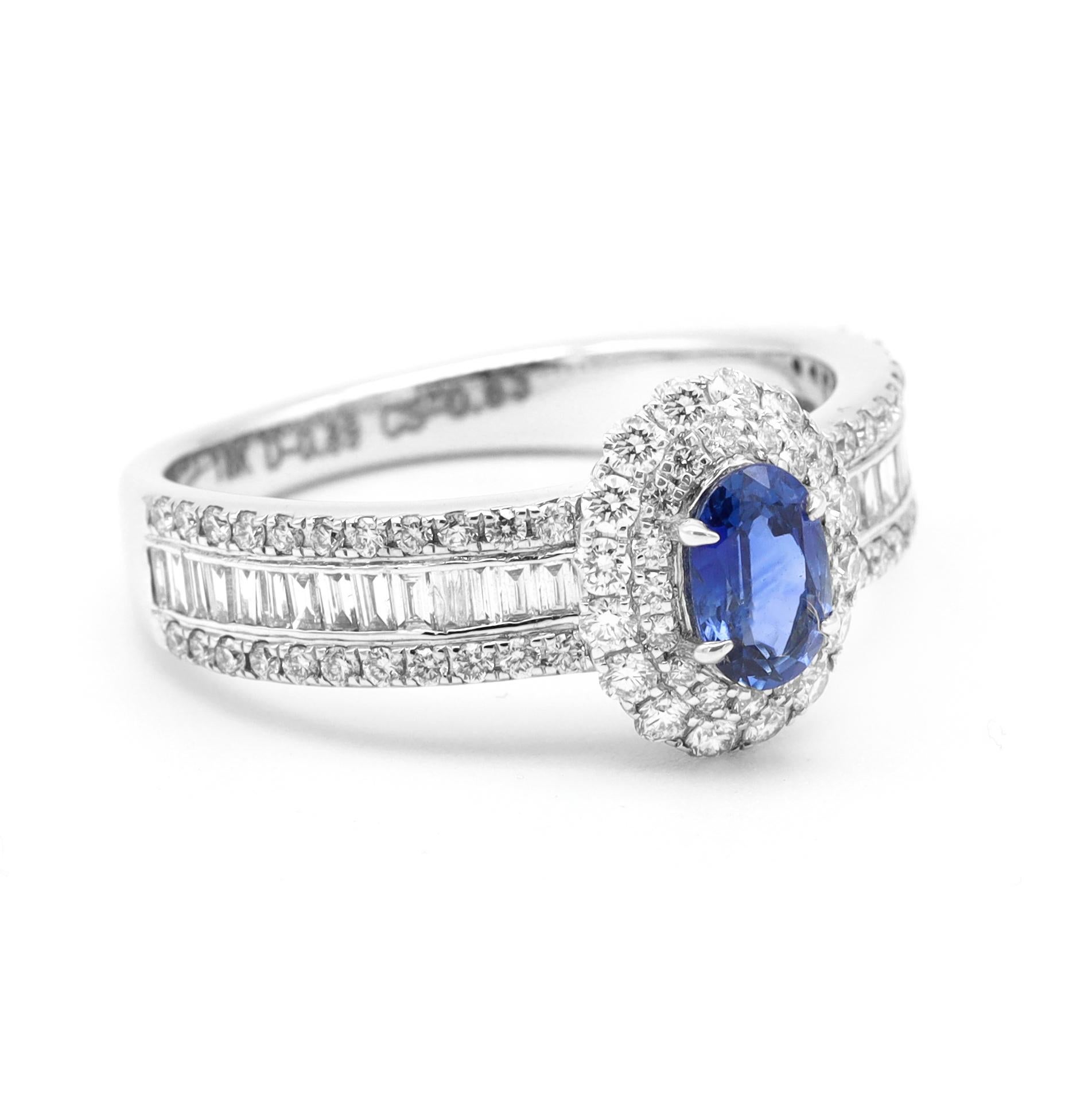 18 Karat White Gold Blue Sapphire and Diamond Double Cluster Band Ring

This enriching Prussian color blue oval sapphire and double cluster round diamond ring is mesmerizing. The vibrant oval blue sapphire solitaire is firstly surrounded by a halo