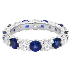 18 Karat White Gold Blue Sapphire and Diamond Eternity Band