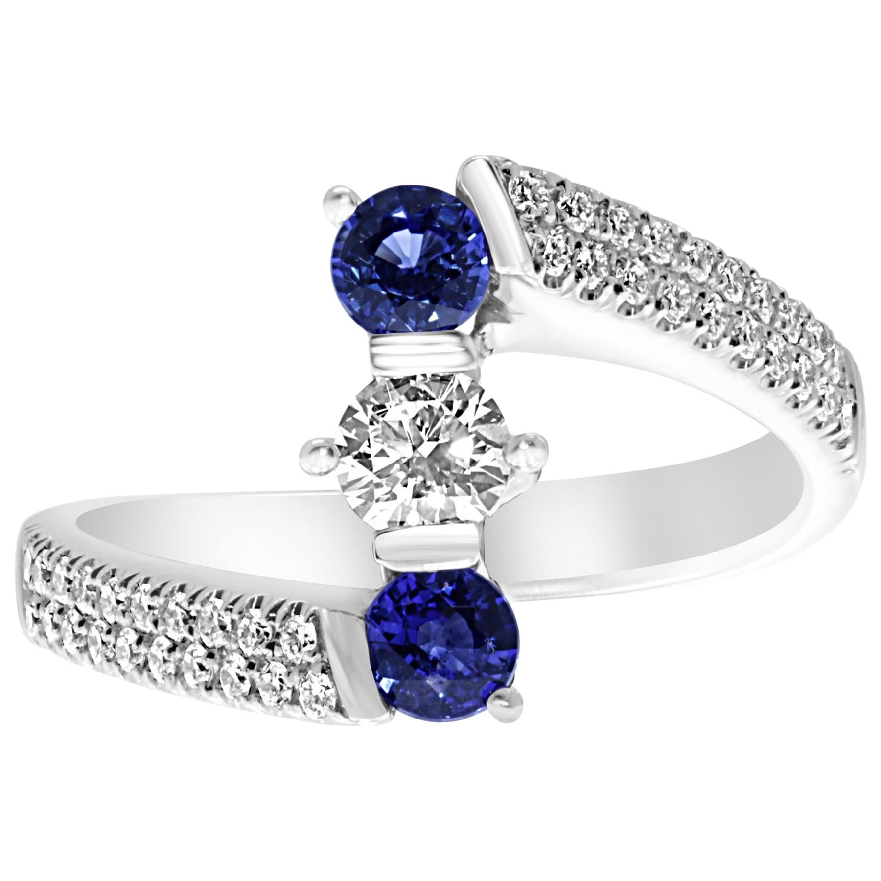 18 Karat White Gold Blue Sapphire and Diamonds Trilogy Ring For Sale