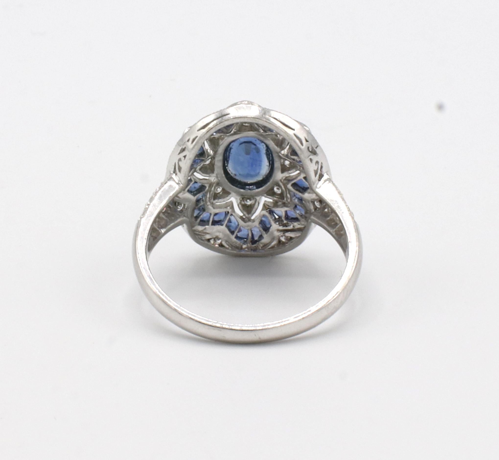 18 Karat White Gold Blue Sapphire & Natural Diamond Dome Ring 
Metal: 18k white gold
Weight: 4.41 grams
Diamonds: Approx. .25 CTW H-I VS round natural diamonds 
Sapphires: Center: Approx. .60 carat blue sapphire
Size: 6 (US)
Top: 17 x 14mm
Height: