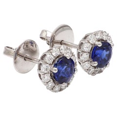 18 Karat White Gold Blue Sapphire Diamond Halo Earring