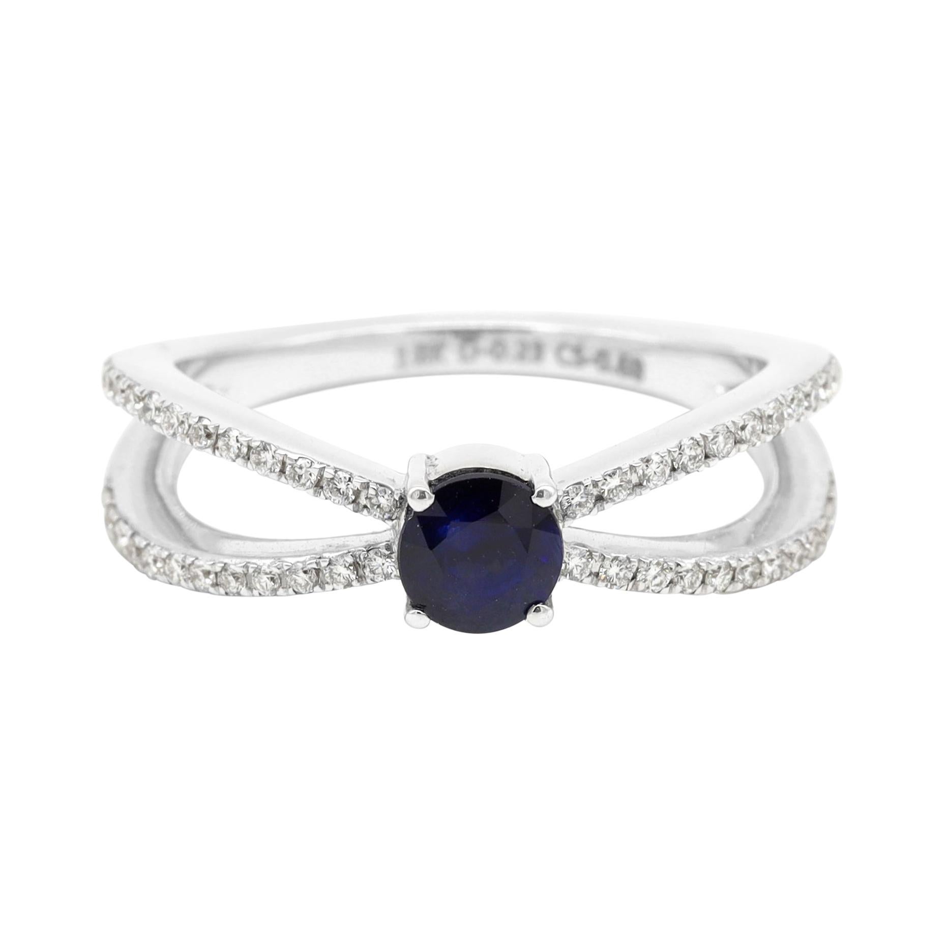 18 Karat White Gold Blue Sapphire Round-Cut and Diamond Ring For Sale