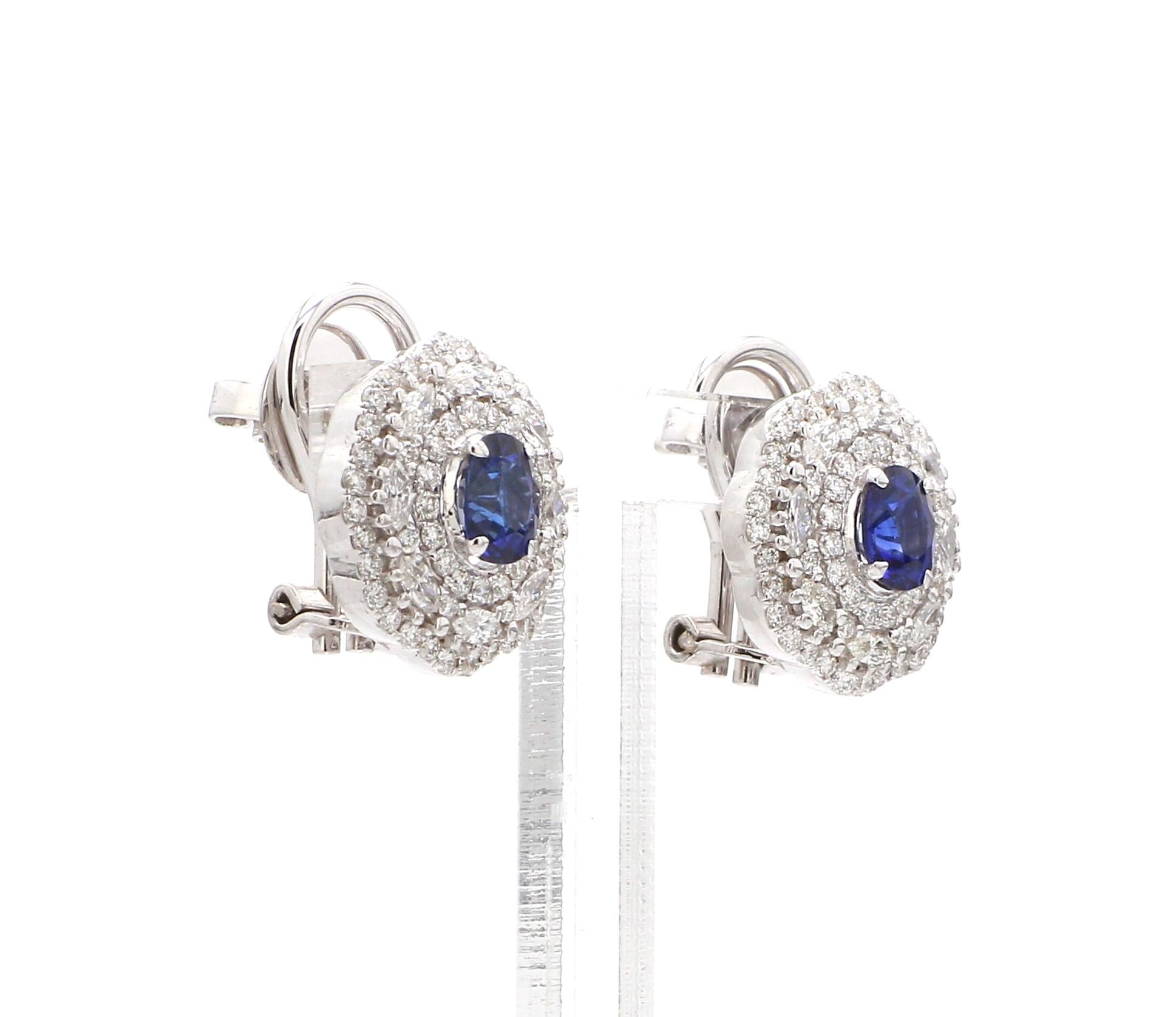 A Beautiful Handcrafted  Earring in 18 karat White Gold with Natural Brilliant Cut Colorless  Round Diamond And AAA Cut Round Blue Sapphire Gemstones. A Statement piece for Evening Wear totaling 1.15 ct of Diamonds & 1.24 Carat of Natural Blue