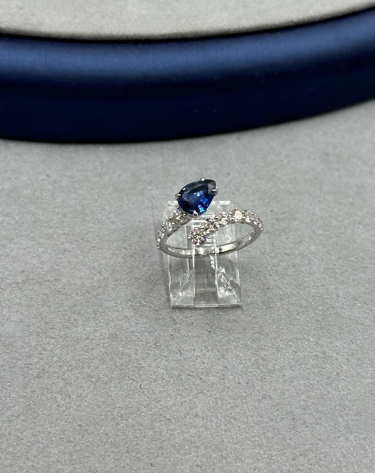 Discover the mesmerizing allure of our Blue Sapphire Snake Ring, a captivating piece that exudes elegance and sophistication.

At the heart of this enchanting ring is a stunning 1.19-carat blue sapphire, exquisitely crafted to showcase its rich and