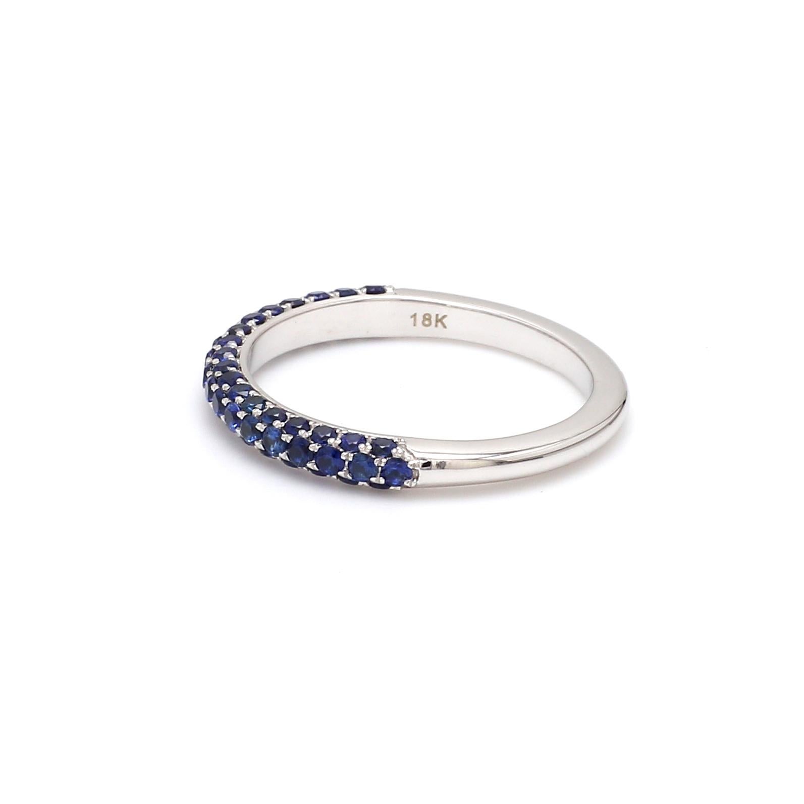 A Beautiful Handcrafted Ring in 18 Karat White Gold with Natural Round Blue Sapphire. A perfect Wedding Ring for the Special occasion

Natural Blue Sapphire Details
Pieces :  55 Pieces
Weight : 0.75 Carat 

Ring Details
Gold : 18 Karat Rose