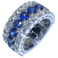 18 Karat White Gold Blue Sapphire White Diamond Band Ring