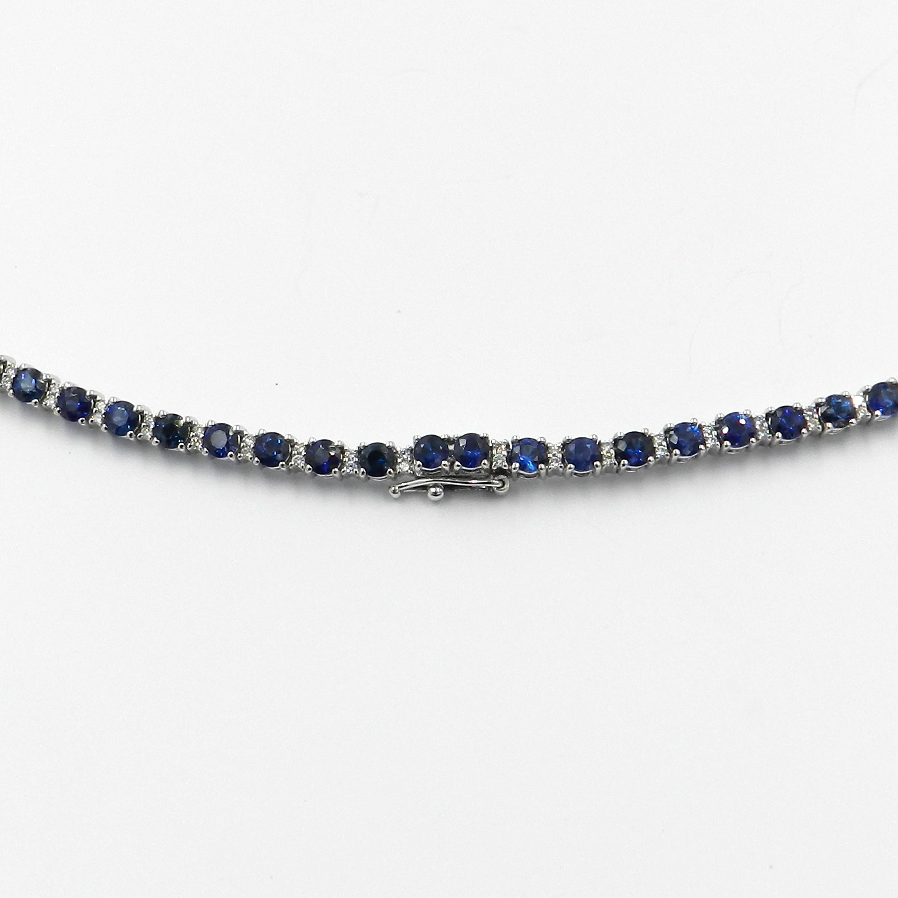 18KT White Gold BLUE SAPPHIRES and DIAMONDS GARAVELLI NECKLACE 

GOLD gr : 30,60
WHITE DIAMONDS ct : 1,15
BLUE SAPPHIRES ct  : 14,30
