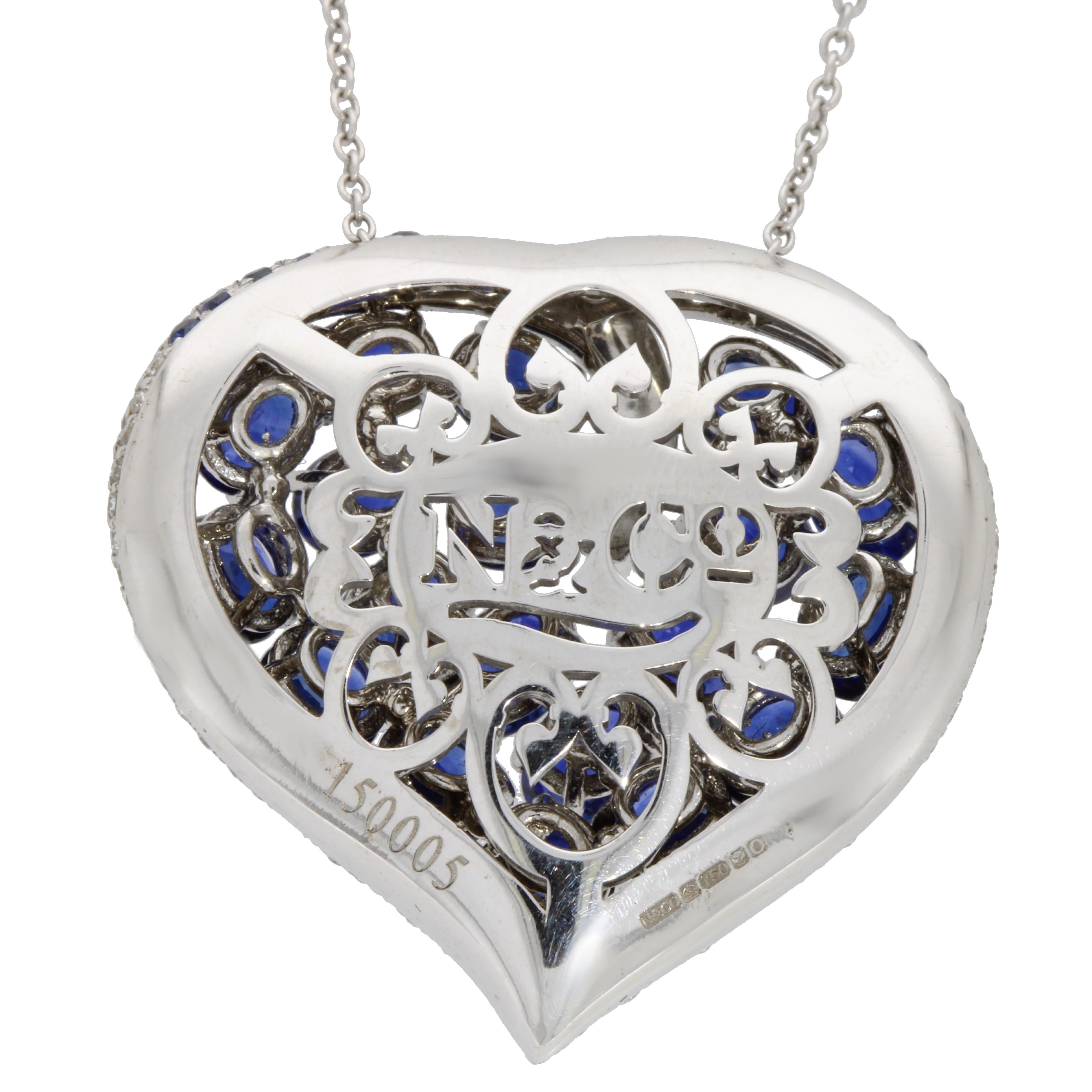 Contemporary 18 Karat White Gold Blue Sapphires and Diamonds Heart Pendant with Chain For Sale