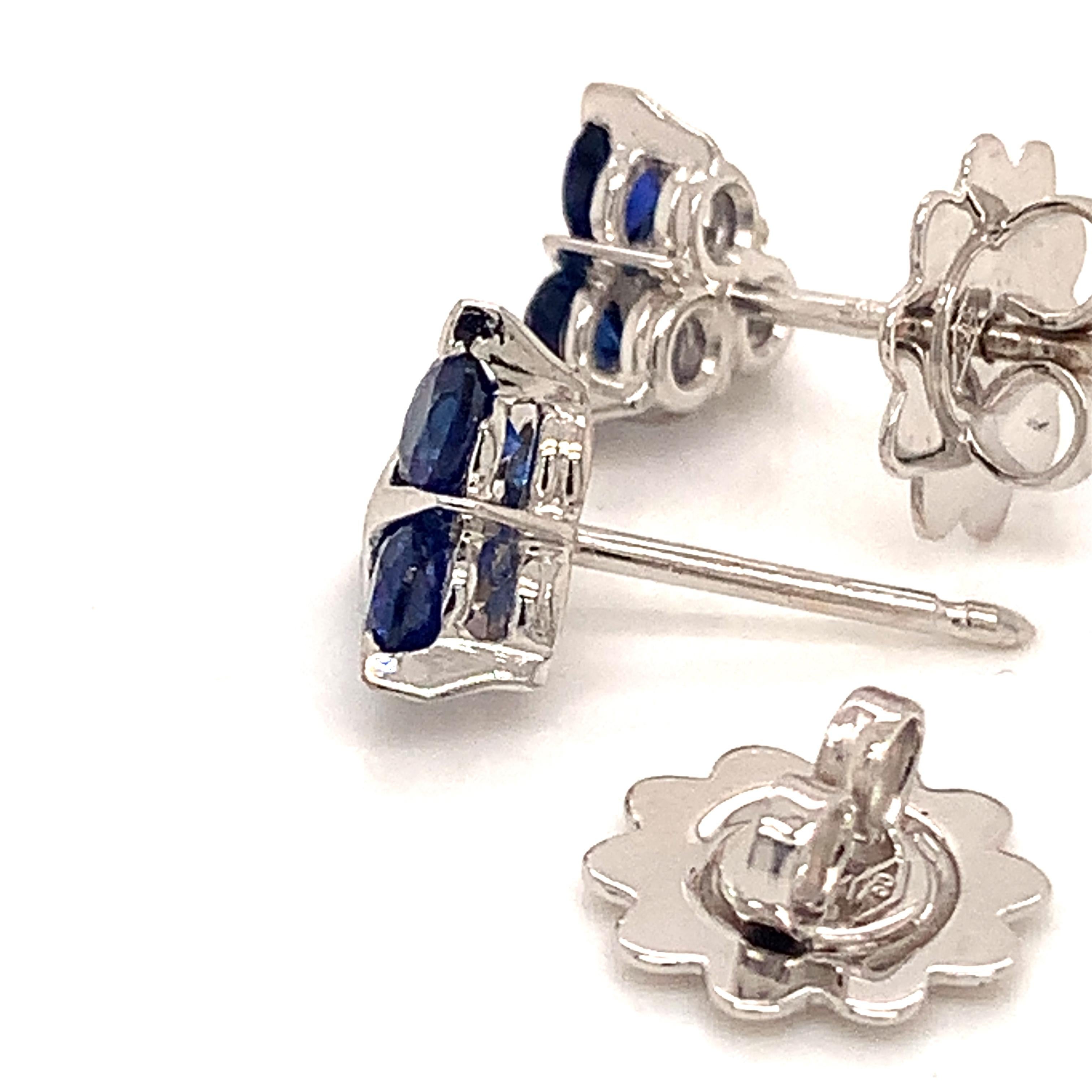 Garavelli EARRINGS in  very unique and pretty design, in white gold 18 kt with three perfect round blue sapphires to a total carat weight of 1.30
 Available also in diamonds, emeralds, rubies, matching items are available.
GOLD grs : 3,20
 Made in