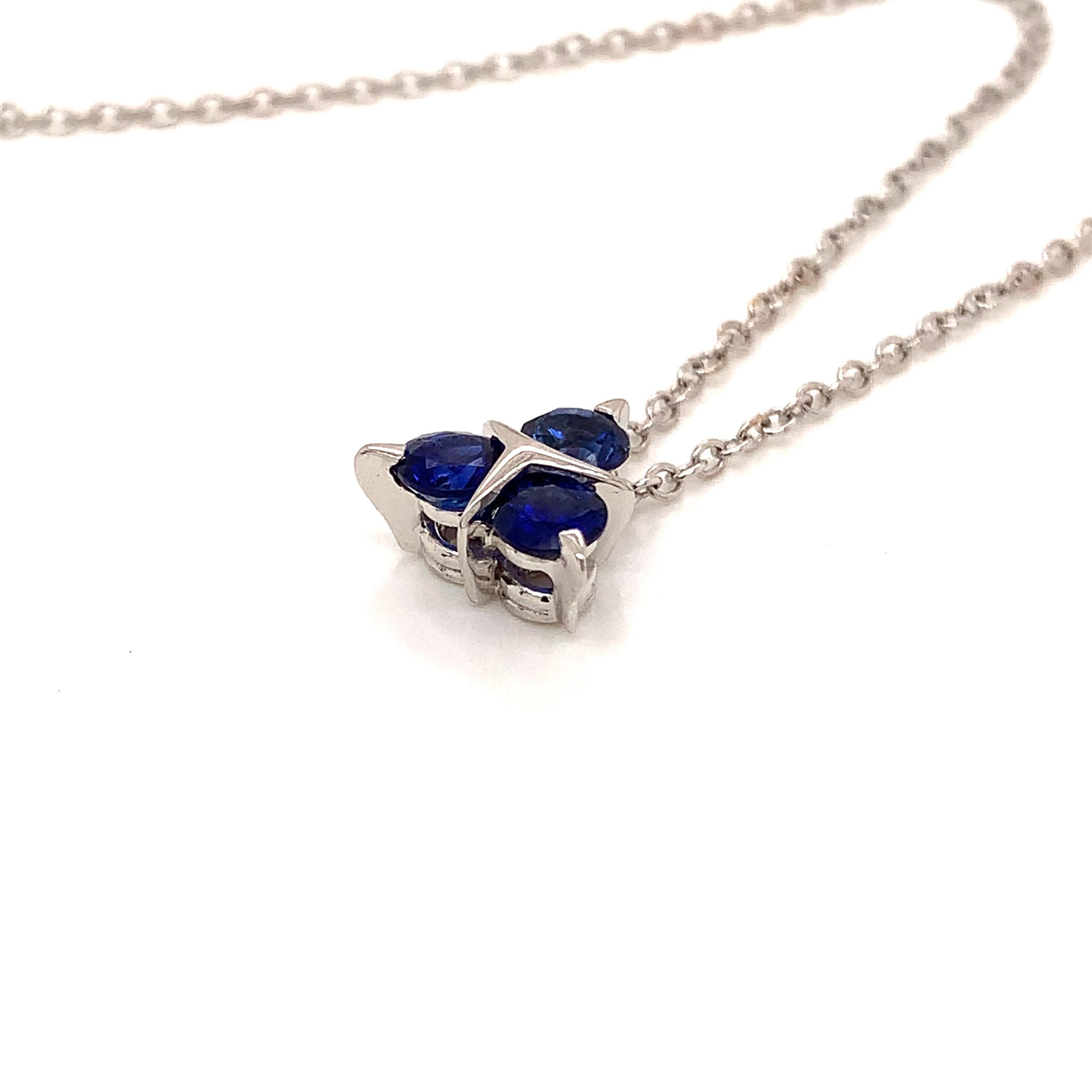 Garavelli pendant with chain in  very unique and pretty design, in white gold 18 kt with three perfect round blue sapphires to a total carat weight of 0.70
 Available also in diamonds, emeralds, pink sapphires, rubies. Matching earrings are