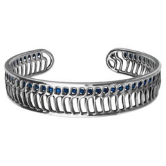 18 Karat White Gold Blue Sapphires Open Wave Cuff Bracelet