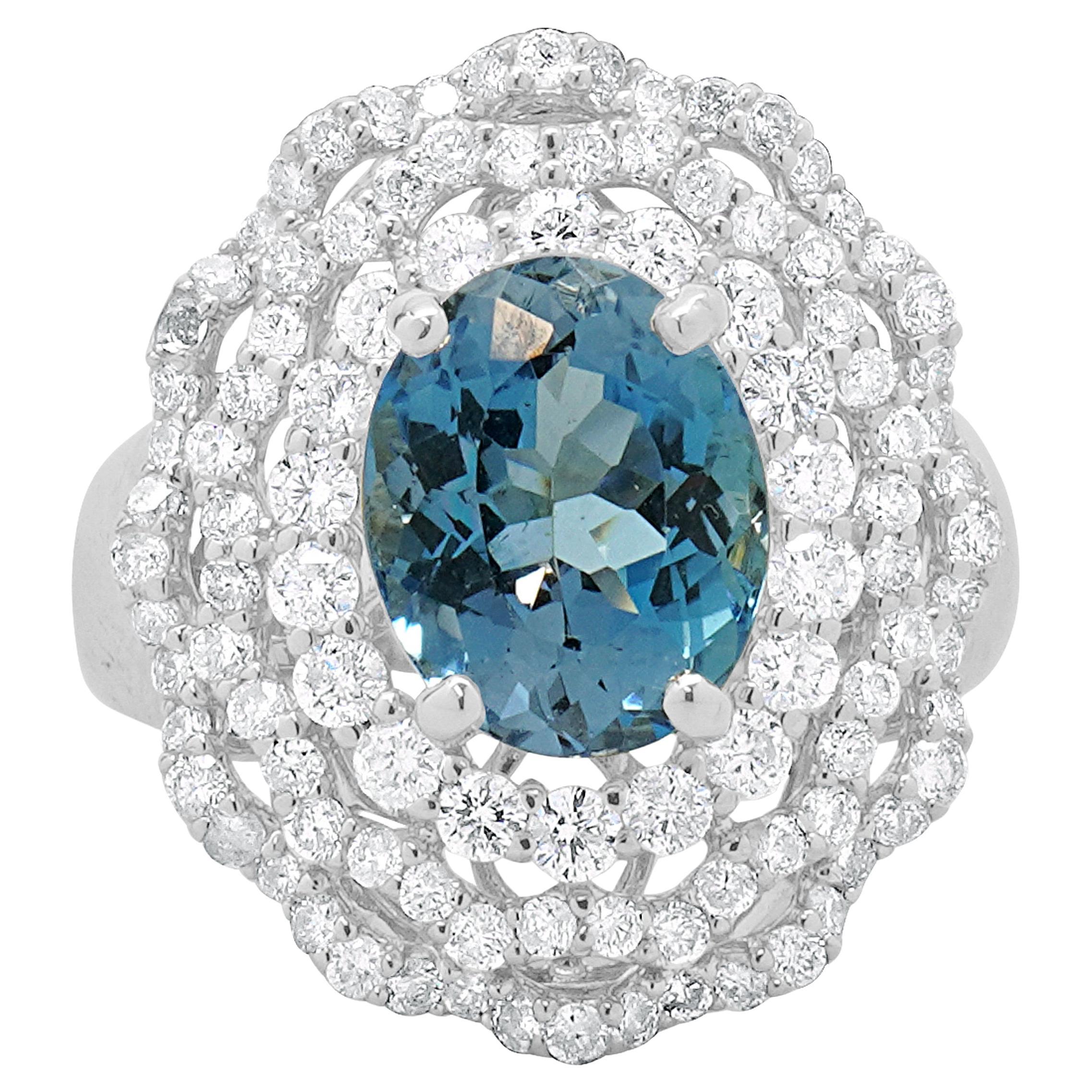 18 Karat White Gold Blue Topaz and Diamond Ballerina Ring