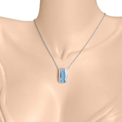 14 Karat White Gold Blue Topaz Channel-set Baguettes Diamond Pendant Necklace