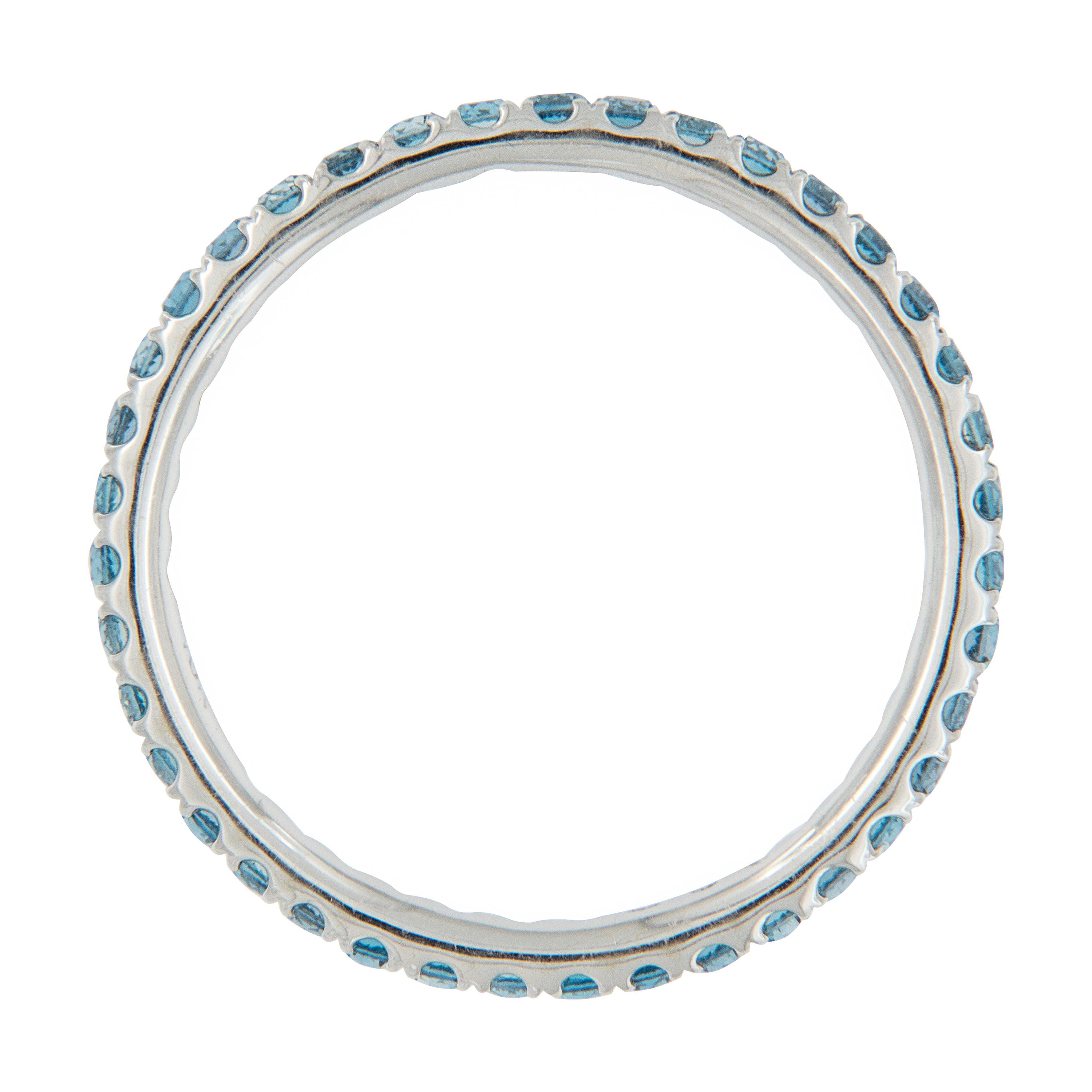 blue topaz eternity ring white gold