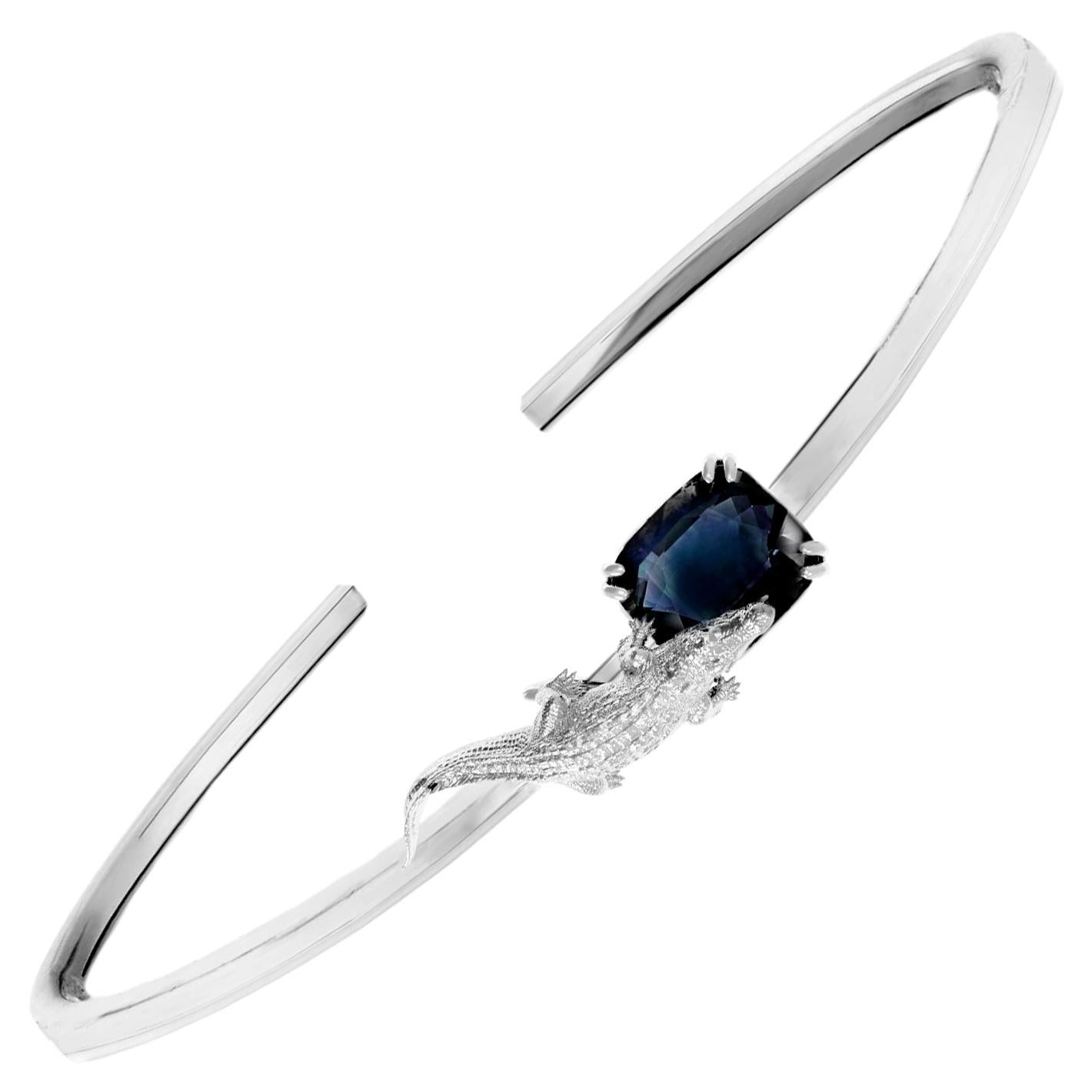 White Gold Sculptural Bangle Bracelet with Four Carats Blue Sapphire For Sale