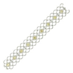 18 Karat White Gold Bracelet with Fancy Yellow Radiant Cut Diamonds