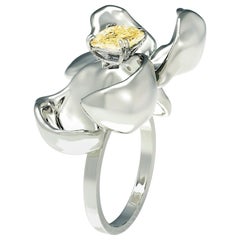18 Karat White Gold Engagement Ring with GIA Cert. Fancy Light Yellow Diamond